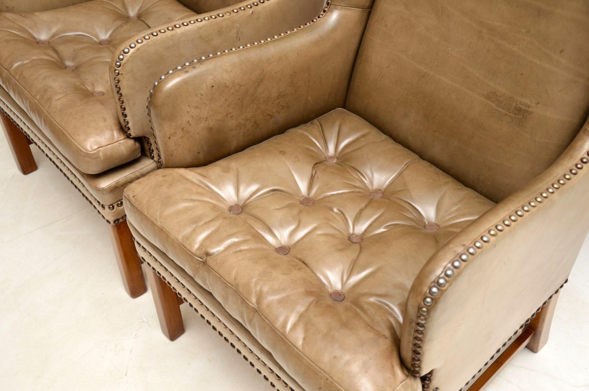 Mid-20th Century Pair of Antique Swedish Leather Wingback Armchairs