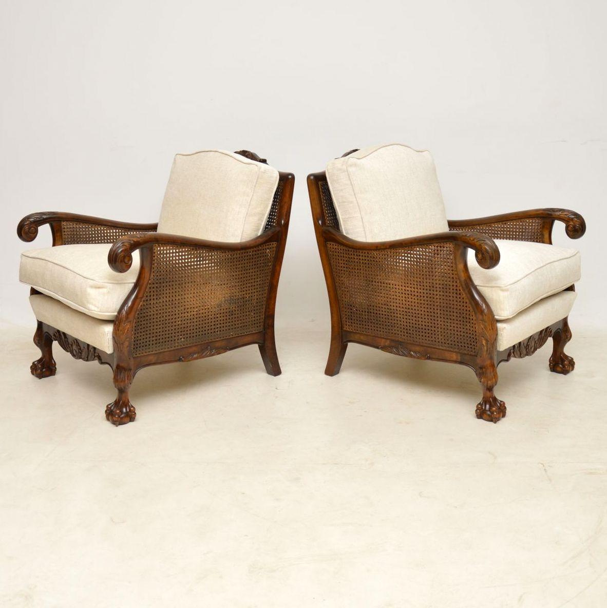 This pair of antique Swedish bergère armchairs are not only great looking, but very comfortable too, because we have re-upholstered them using brand new feather cushions. The frames are satin birch, with that wonderful light and dark grain, plus