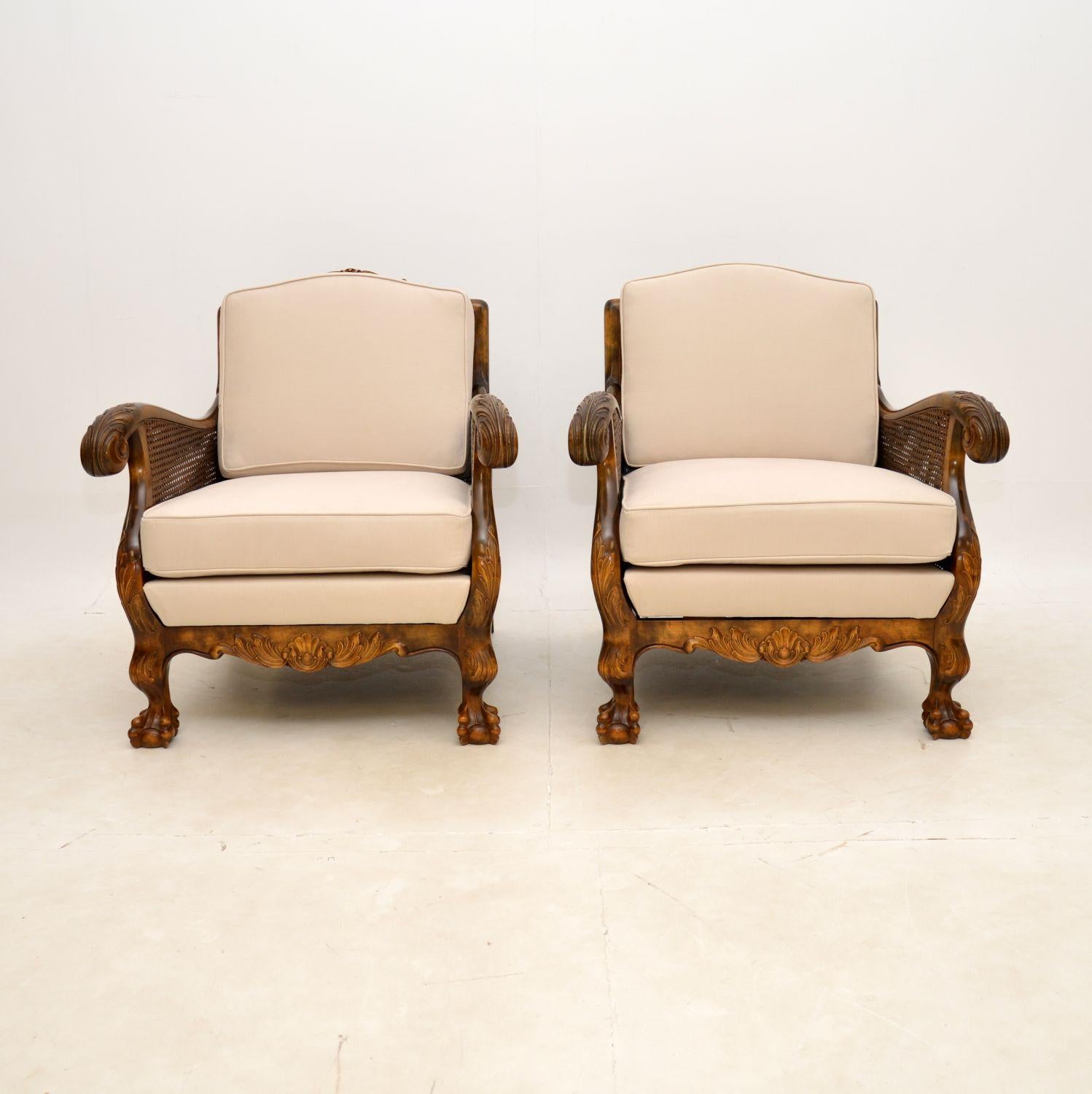 Pair of antique Chippendale style Swedish satin birch bergere armchairs in excellent condition & dating to around the 1920-1930s period.

These armchairs have beautifully shaped frames & detailed carvings all over. They are double caned on the
