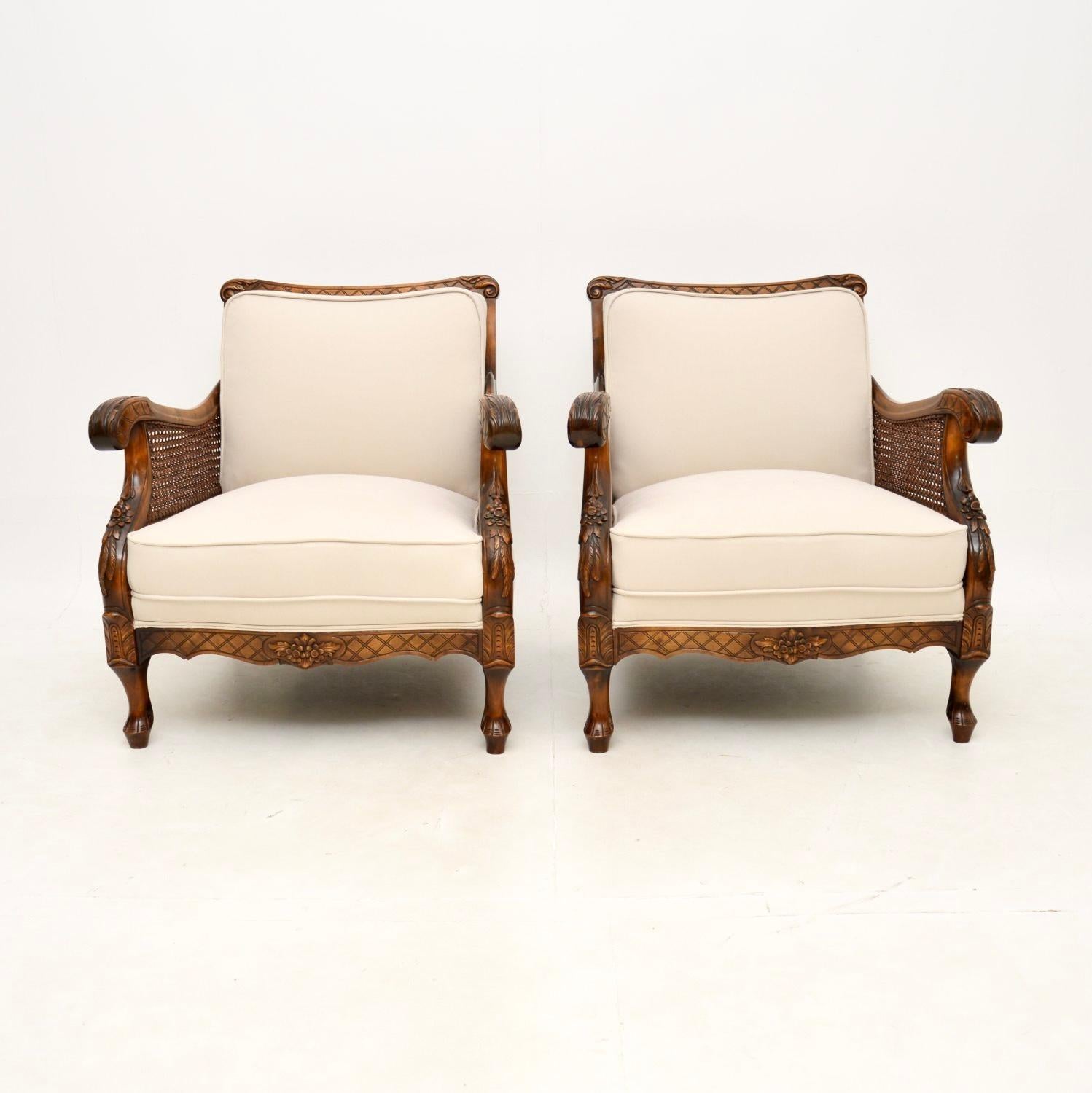 A stunning pair of antique Swedish satin birch bergere armchairs. They were recently imported from Sweden, they date from around the 1900-1910 period.

They are of incredibly fine quality, with beautifully crisp carving throughout. The sides panels