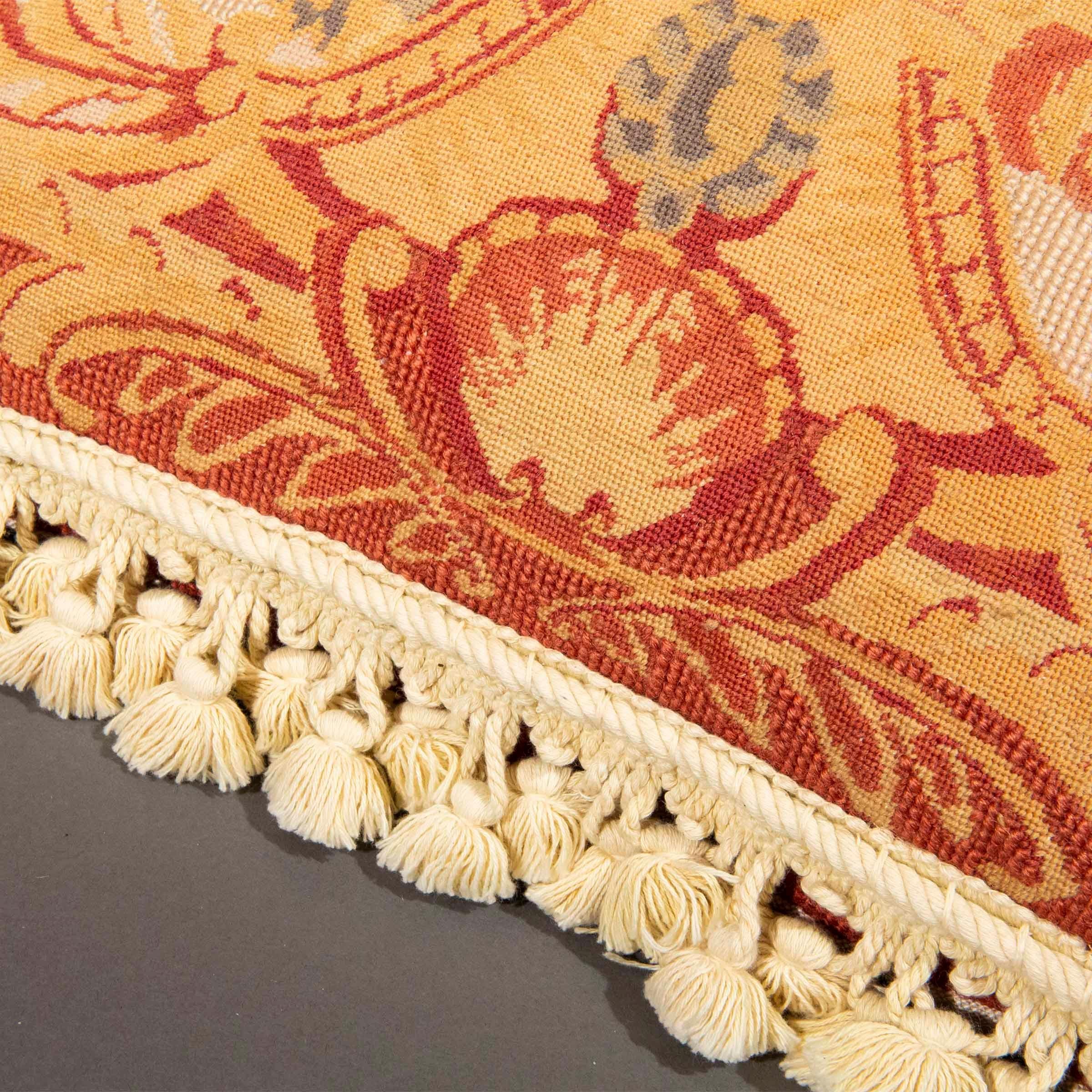 A pair of decorative loose cushions made of antique handwoven tapestry of floral design, with modern linen backing and tassel fringe edging.
French, late 19th – early 20th century.

Dimensions
19 by 19 in / 48 by 48 cm.