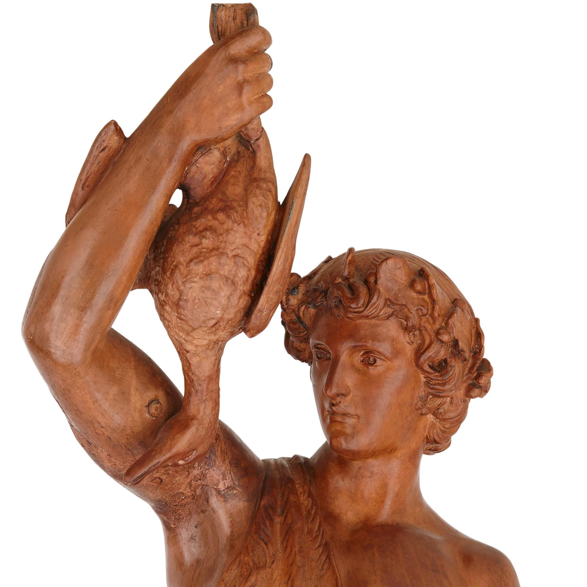Pair of antique terracotta allegorical figures For Sale 1