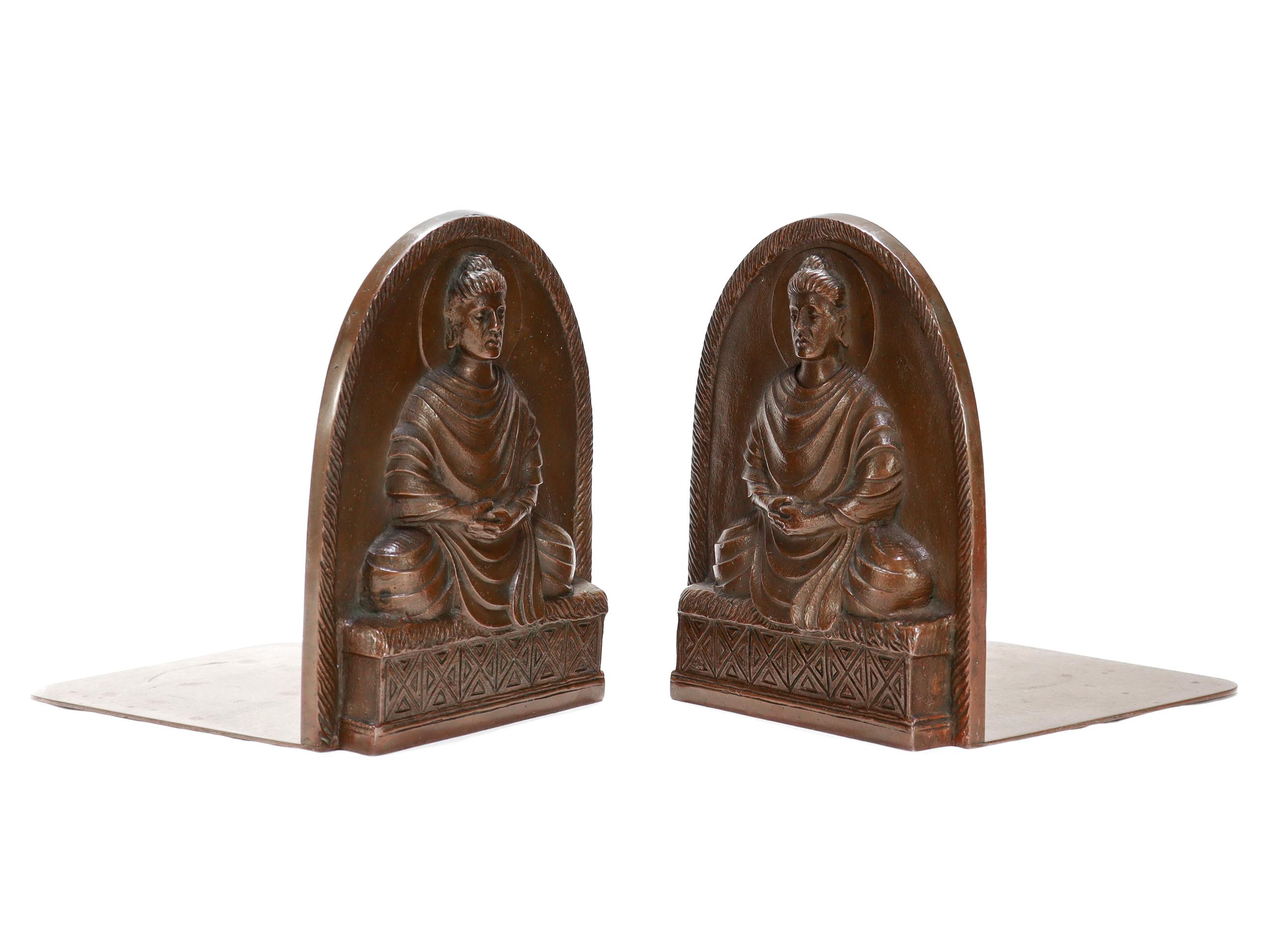 A fine pair of antique signed bronze bookends.

By Tiffany Studios of New York, NY.

In bronze.

Pattern no. 1025.

Each with a Buddha design.

Simply a wonderful Tiffany design!

Date:
Early 20th Century

Overall Condition:
They are in overall