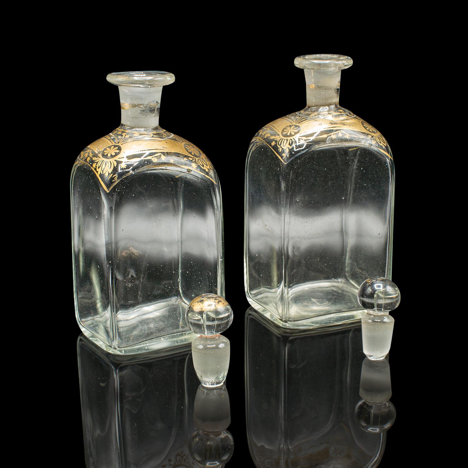 This is a fine pair of antique tincture bottles. An English, duo of glass apothecary jars, dating to the Georgian period, circa 1800. A superb and decorative example of early pharmaceutical glassware.

Charming Georgian period apothecary bottles,