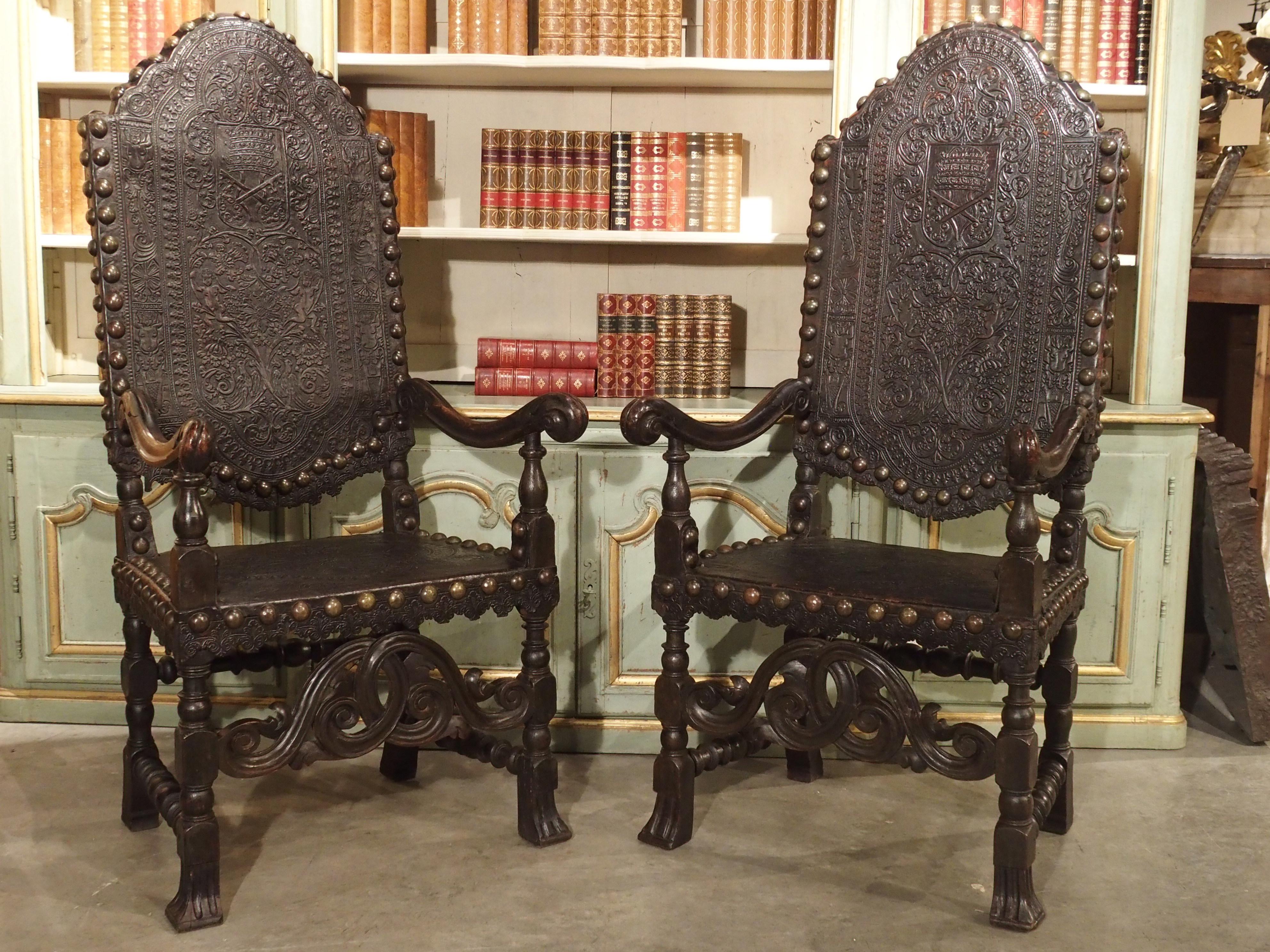 Spanish Pair of Antique Tooled Leather and Oak Armchairs from Spain