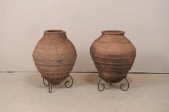 Pair of Antique Turkish Olive Jars Made of Terracotta on Scrolled Metal Stands