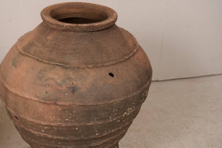 Pair of Antique Turkish Olive Jars Made of Terracotta on Scrolled Metal