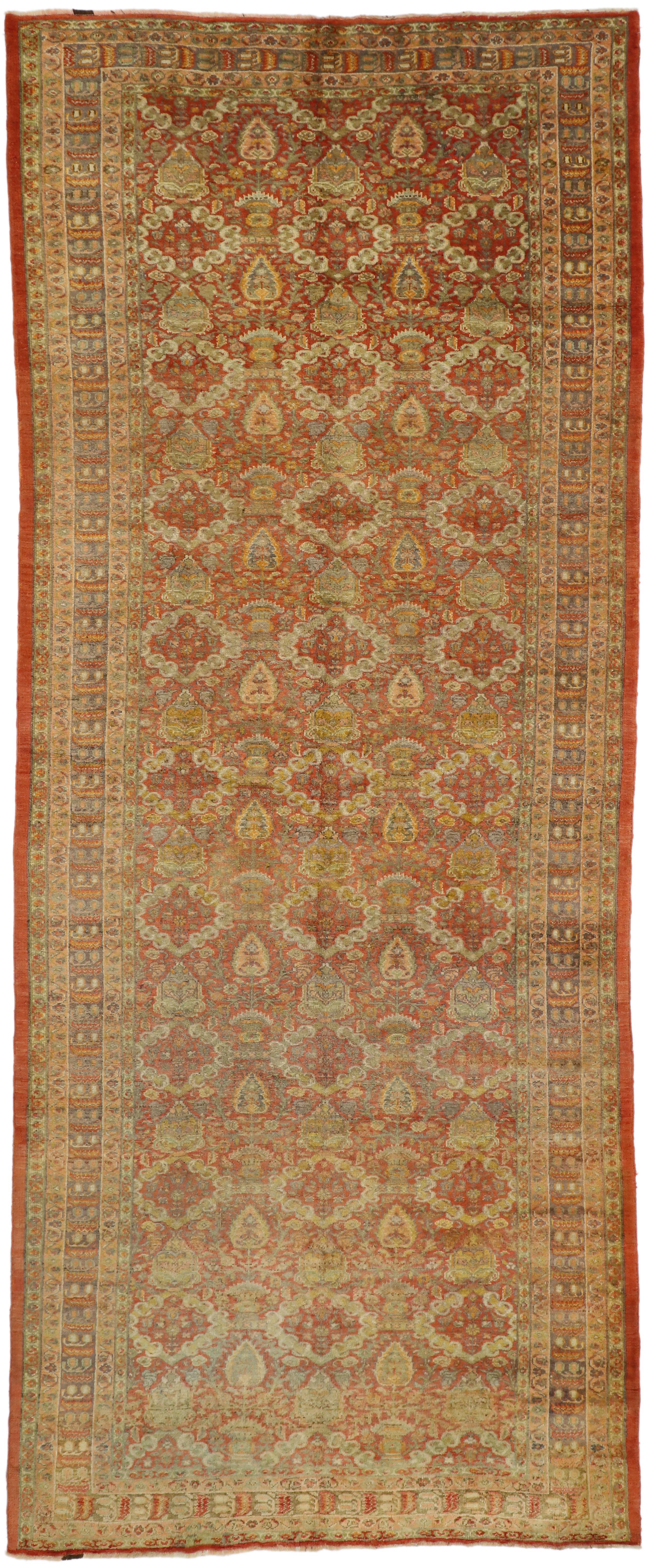 51018-51019 Pair of Antique Turkish Oushak Gallery Rugs, Matching Wide Hallway Runners. Enjoy a warm and historical feel to nearly any space with this pair of antique Turkish Oushak runners. Each antique Oushak runner features an all-over geometric