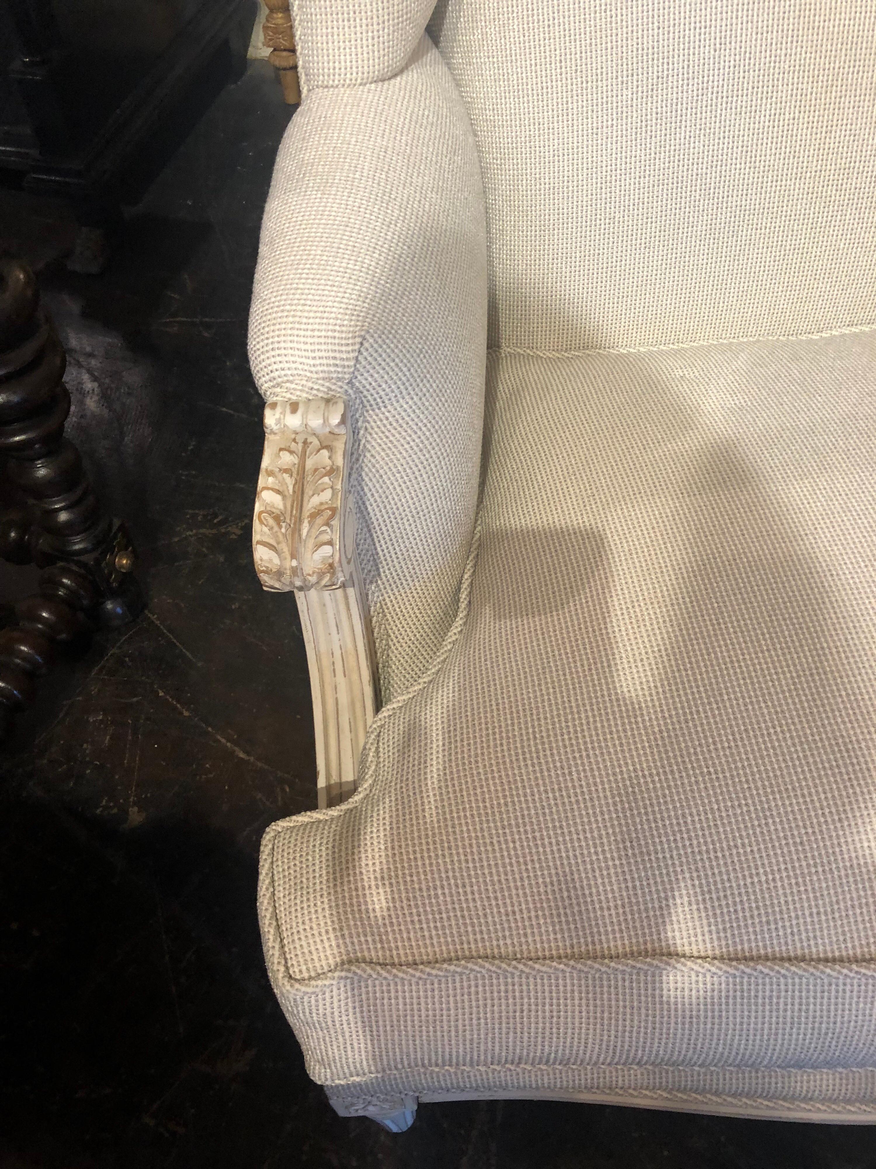Beautiful pair of large scale French Bergeres, Lovely upholstery in a creme fabric. 
Very comfortable and elegant!
