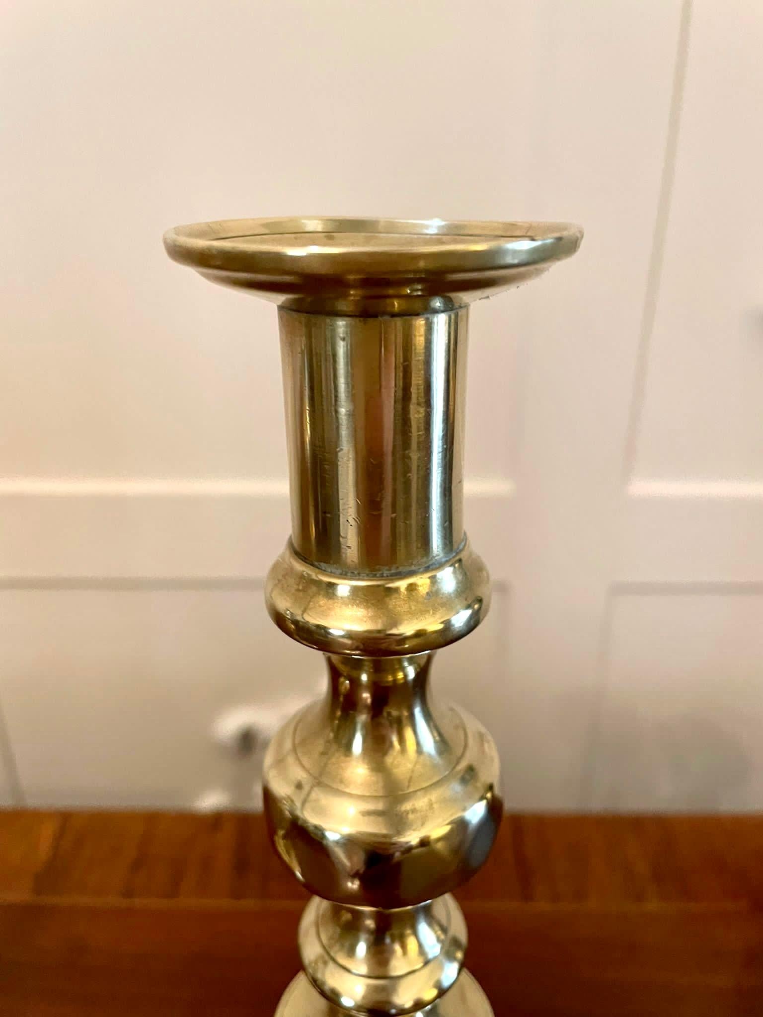 Pair of antique Victorian brass candlesticks having a beehive and diamond shaped column raised on a square stepped base.

In lovely original condition.

H 27.5cm 
W 9.5cm 
D 9.5cm
Date 1860
NO 3.