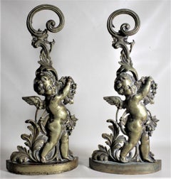 Pair of Antique Victorian Cast Brass Figural Cherub Door Stops or Sculptures