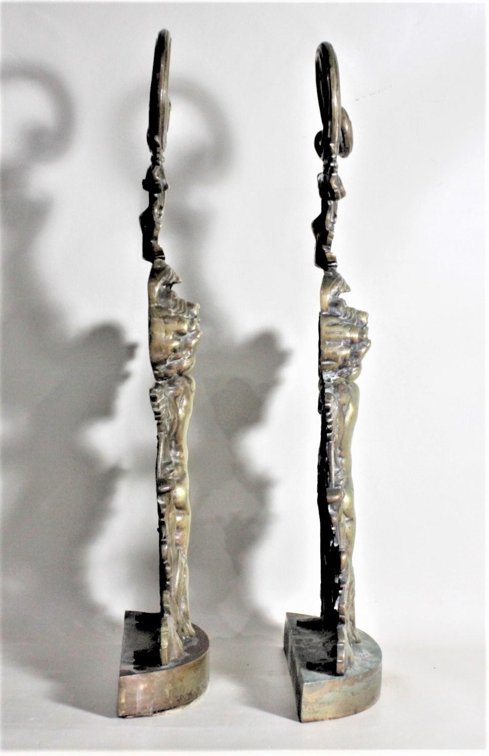 Vittoriano Coppia di antichi fermaporta o sculture di cherubini figurativi in ottone fuso di epoca vittoriana in vendita