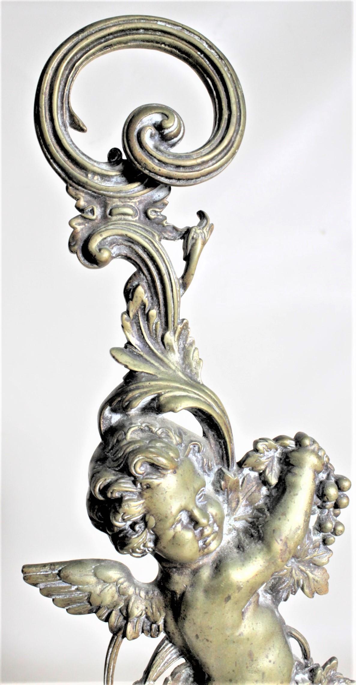 Pair of Antique Victorian Cast Brass Figural Cherub Door Stops or Sculptures In Good Condition For Sale In Hamilton, Ontario
