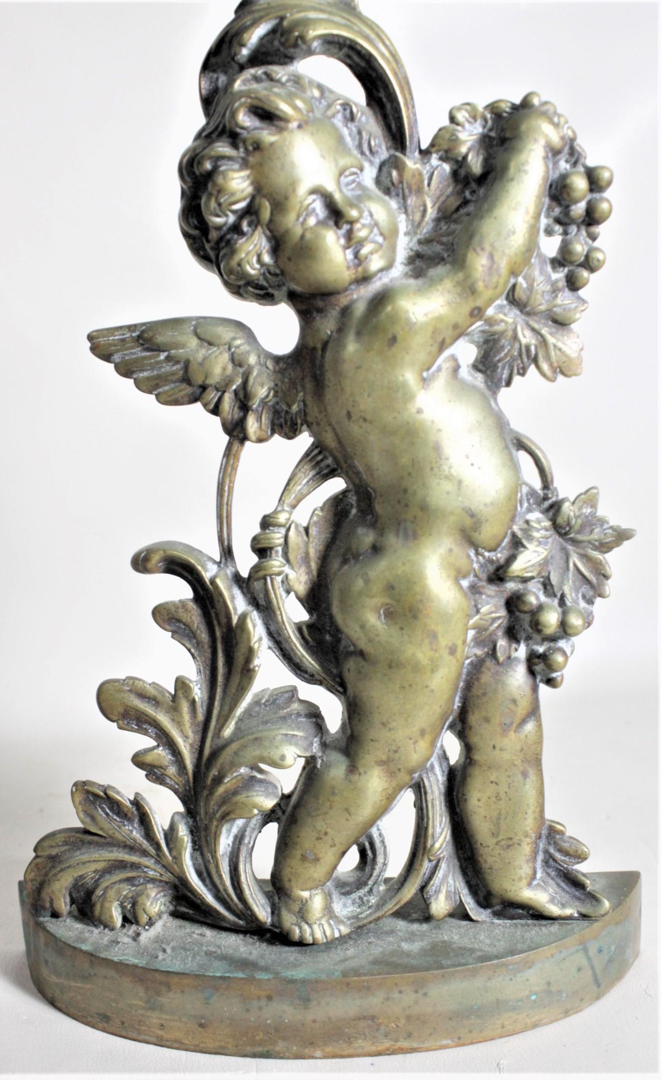 19th Century Pair of Antique Victorian Cast Brass Figural Cherub Door Stops or Sculptures For Sale