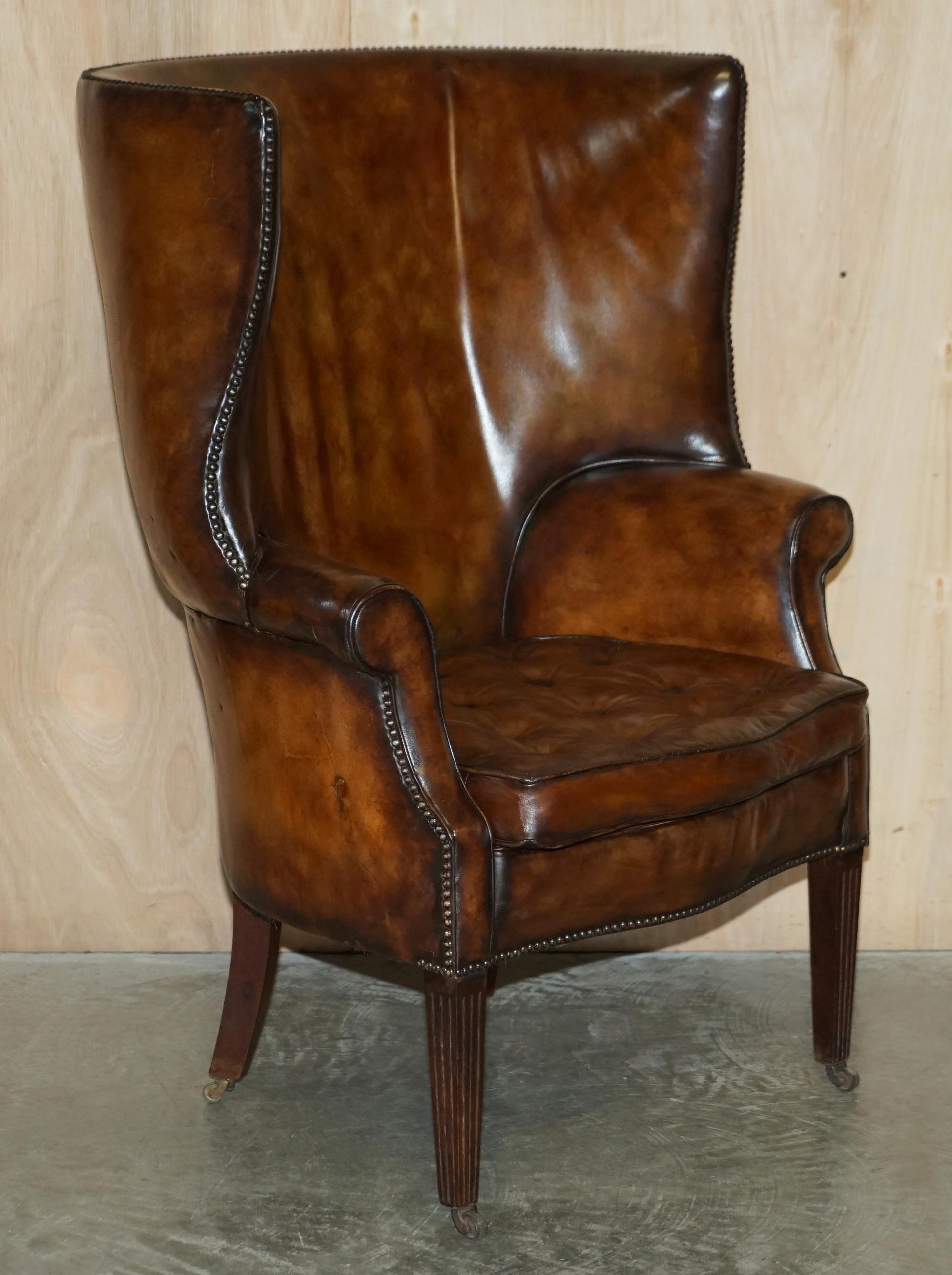 We are delighted to offer for sale this pair of stunning mid Victorian circa 1860 fully restored Porters barrel back armchairs in whisky brown leather with Thomas Chippendale floating button cushions 

These chairs are a real tour de force, they