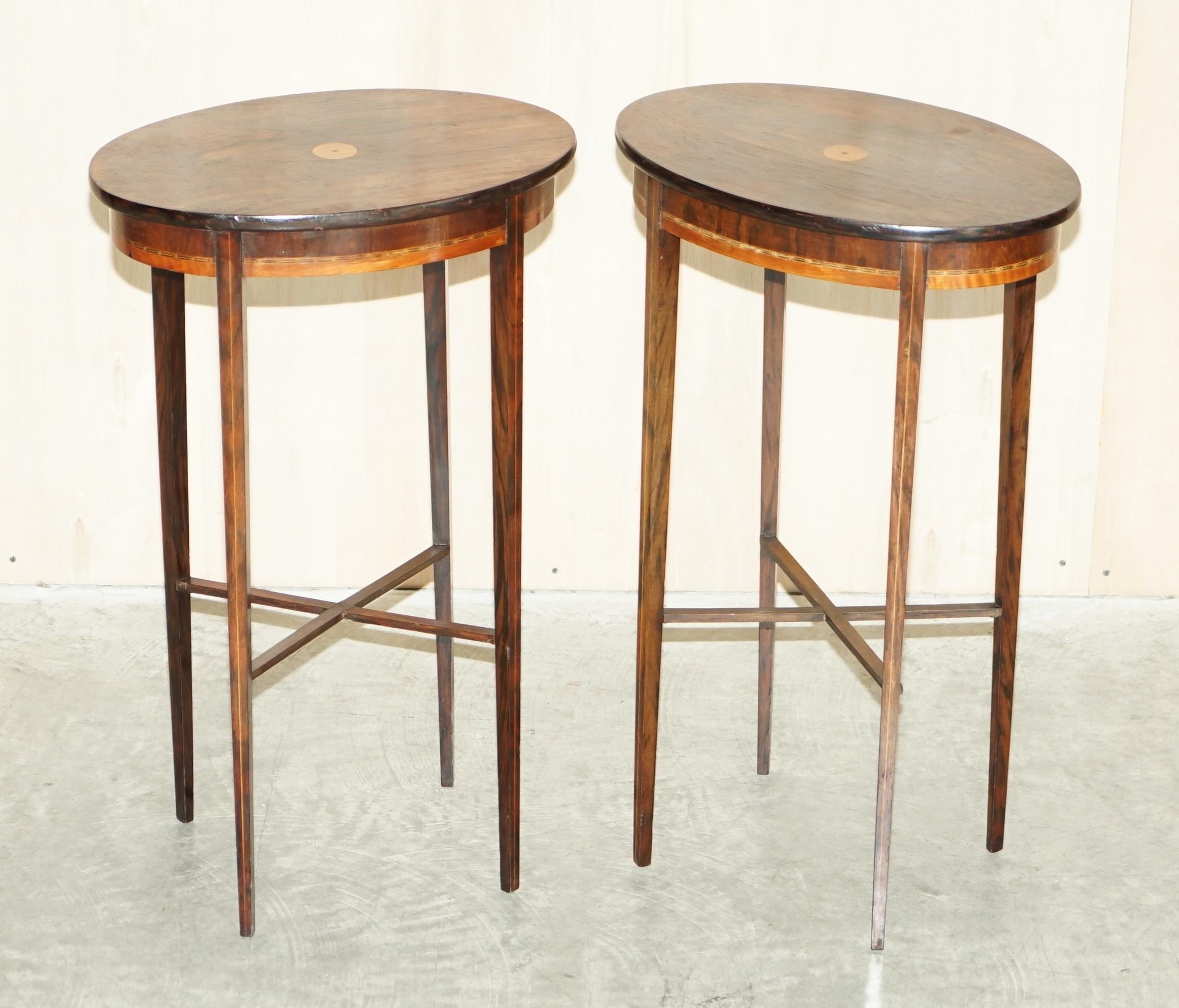 We are delighted to offer this lovely pair of Victorian Rosewood oval lamp tables with lovely walnut and boxwood inlay

A good looking and elegant pair of Victorian tall side tables, ideally suited as art furniture on their own or with a silver