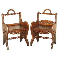 PAIR OF ANTIQUE ViCTORIAN ENGLISH HAND CARVED HALL CHAIRS WITH ROTATING HANDLES