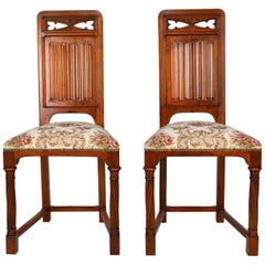 Pair of Antique Victorian Gothic Revival Chairs in Carved Walnut, 19th Century