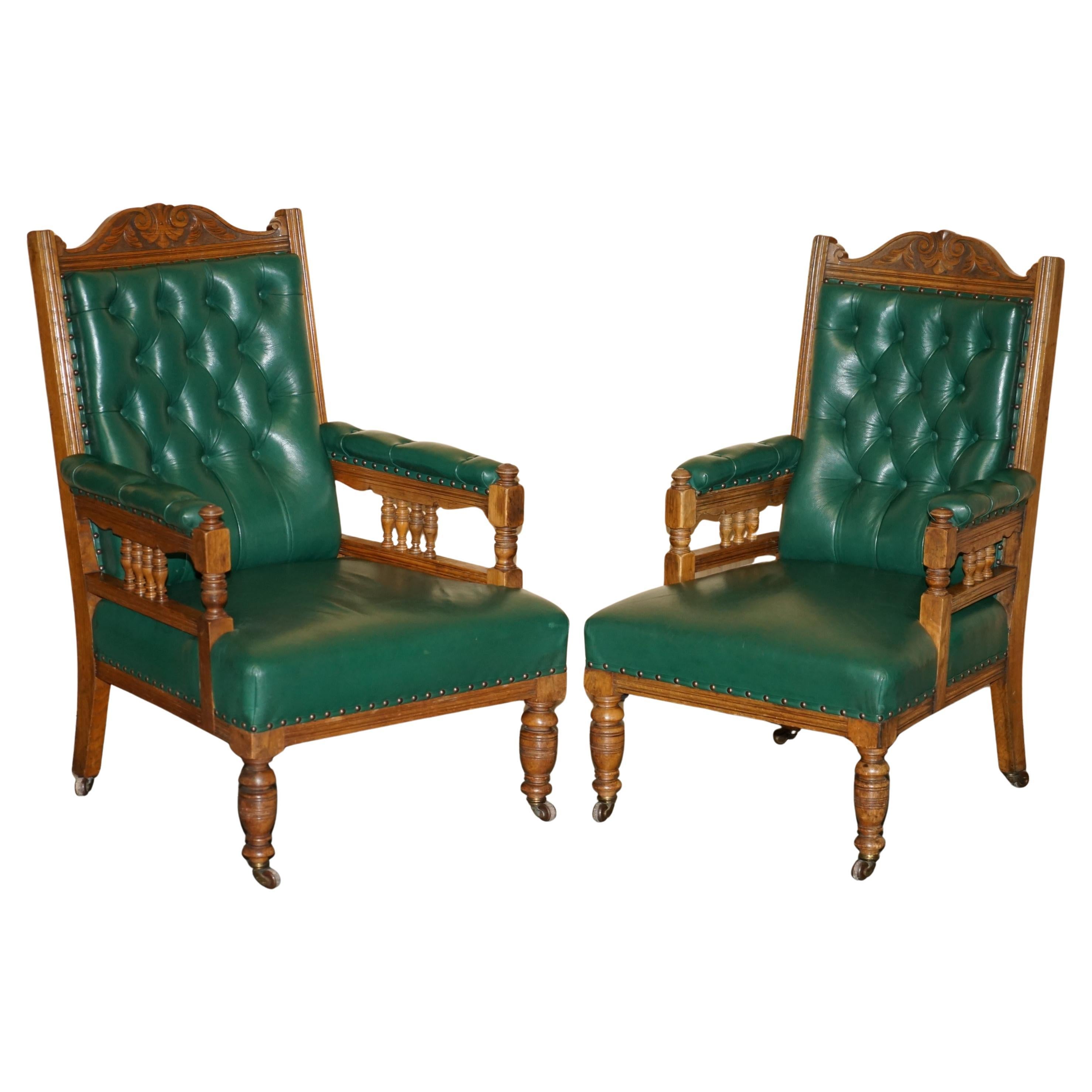 PAIR OF ANTIQUE ViCTORIAN HAND CARVED ENGLISH OAK & LEATHER LIBRARY ARMCHAIRS