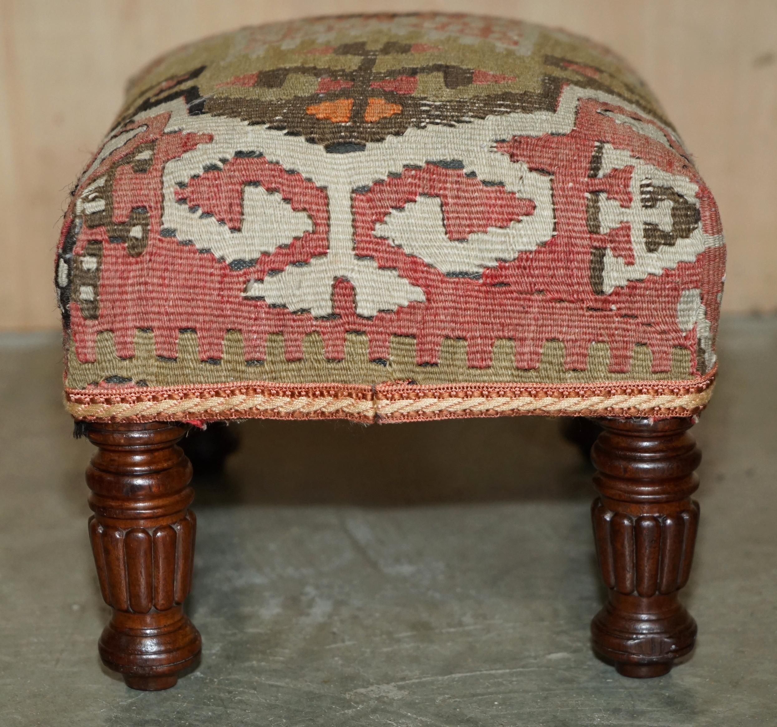 PAIR OF ANTiQUE VICTORIAN KILIM UPHOLSTERED WINGBACK ARMCHAIR FOOTSTOOLS For Sale 1