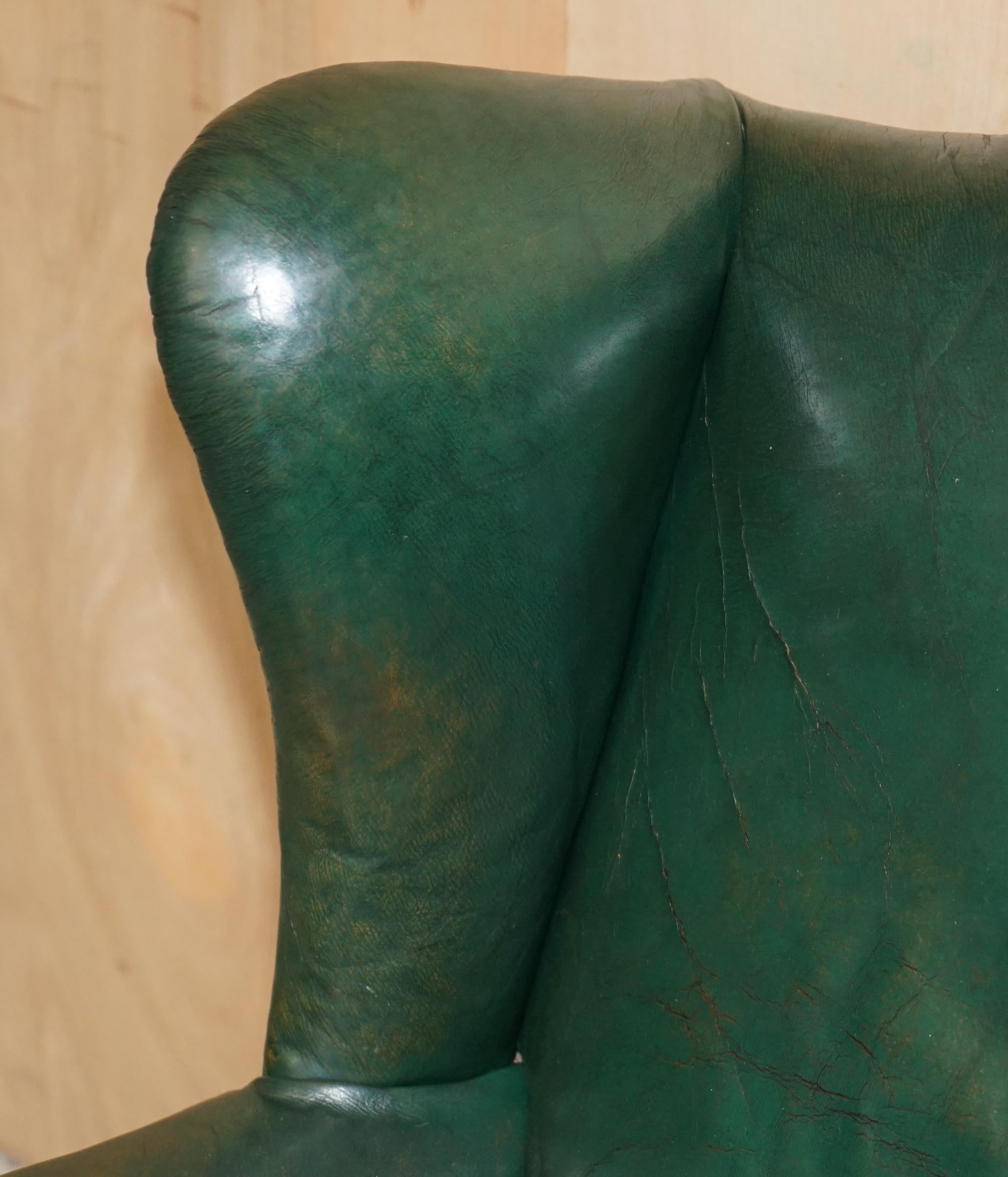 Hand-Crafted PAIR OF ANTIQUE VICTORIAN ORIGINAL GREEN LEATHER UPHOLSTERY WINGBACK ARMCHAIRs For Sale