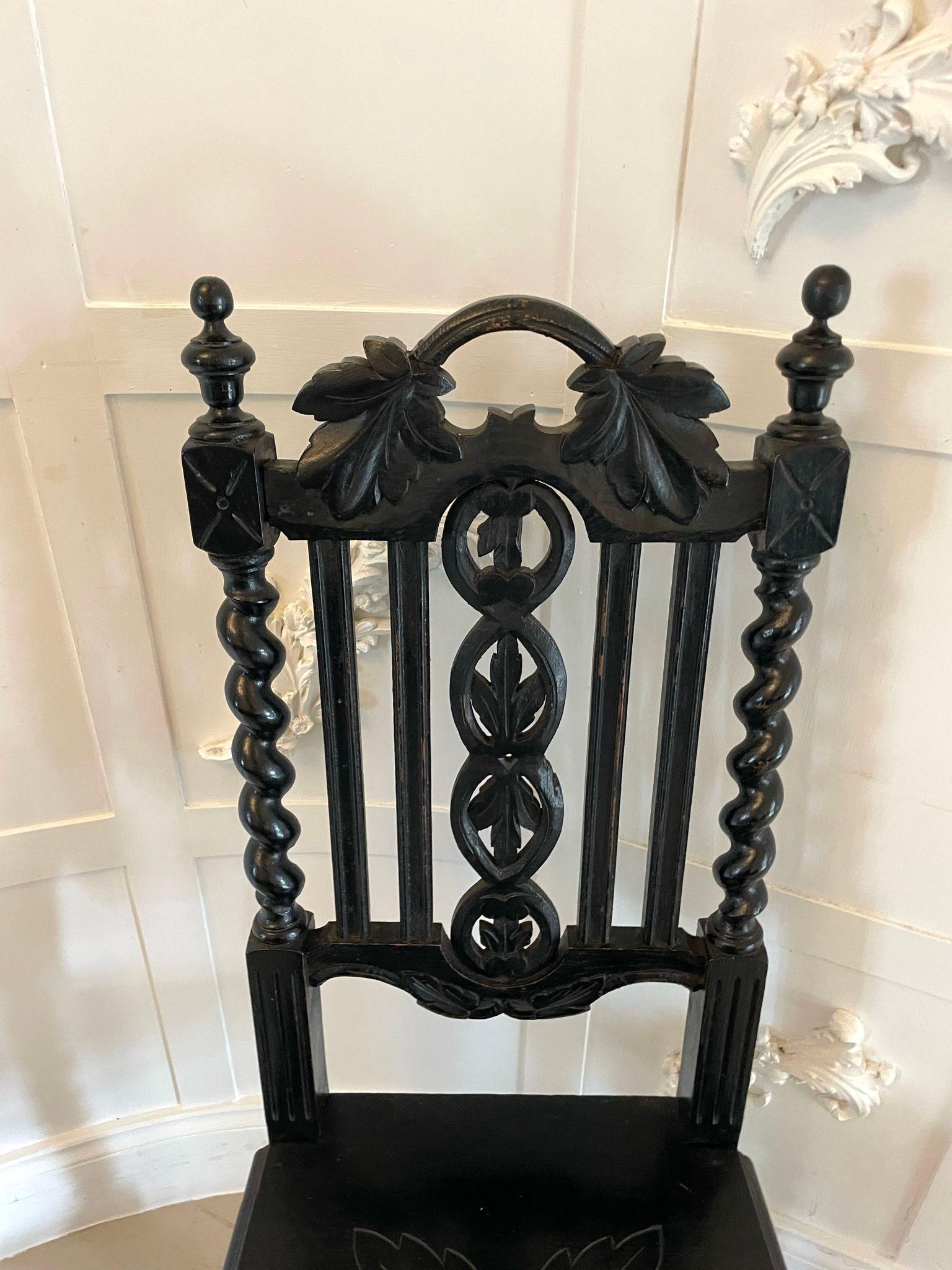 Pair of antique Victorian quality carved ebonised oak side chairs having quality ebonised oak carved backs depicting leaves and barley twist supports unusual carved oak seats standing on barley twist legs united by barley twist stretchers