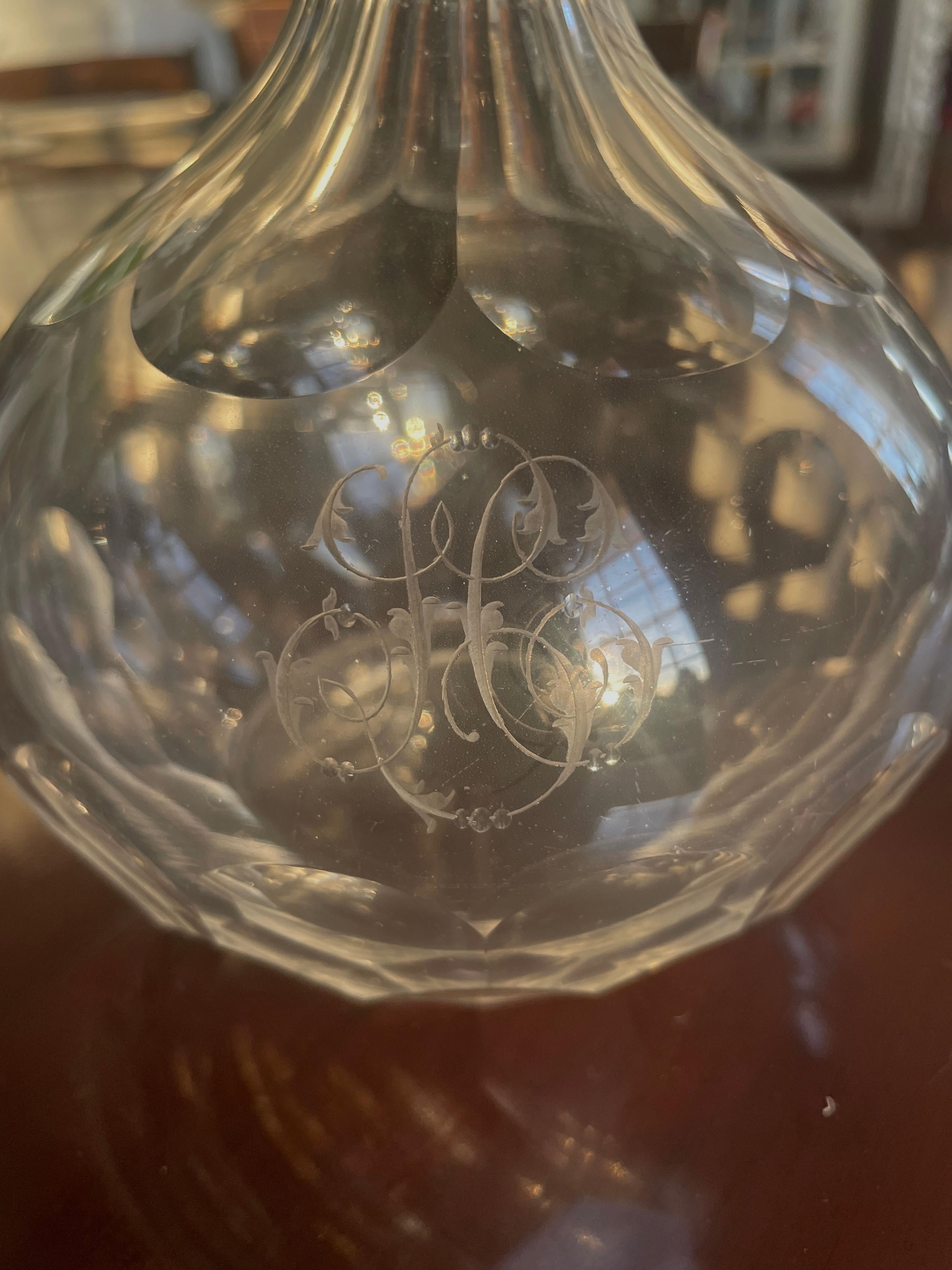 Pair of antique Victorian quality cut glass decanters having the original stoppers above a shaped cut glass decanter boasting a beautifully etched pair of initials to each decanter


In perfect condition


Dimensions:
Height 29 cm 
Width 14 cm