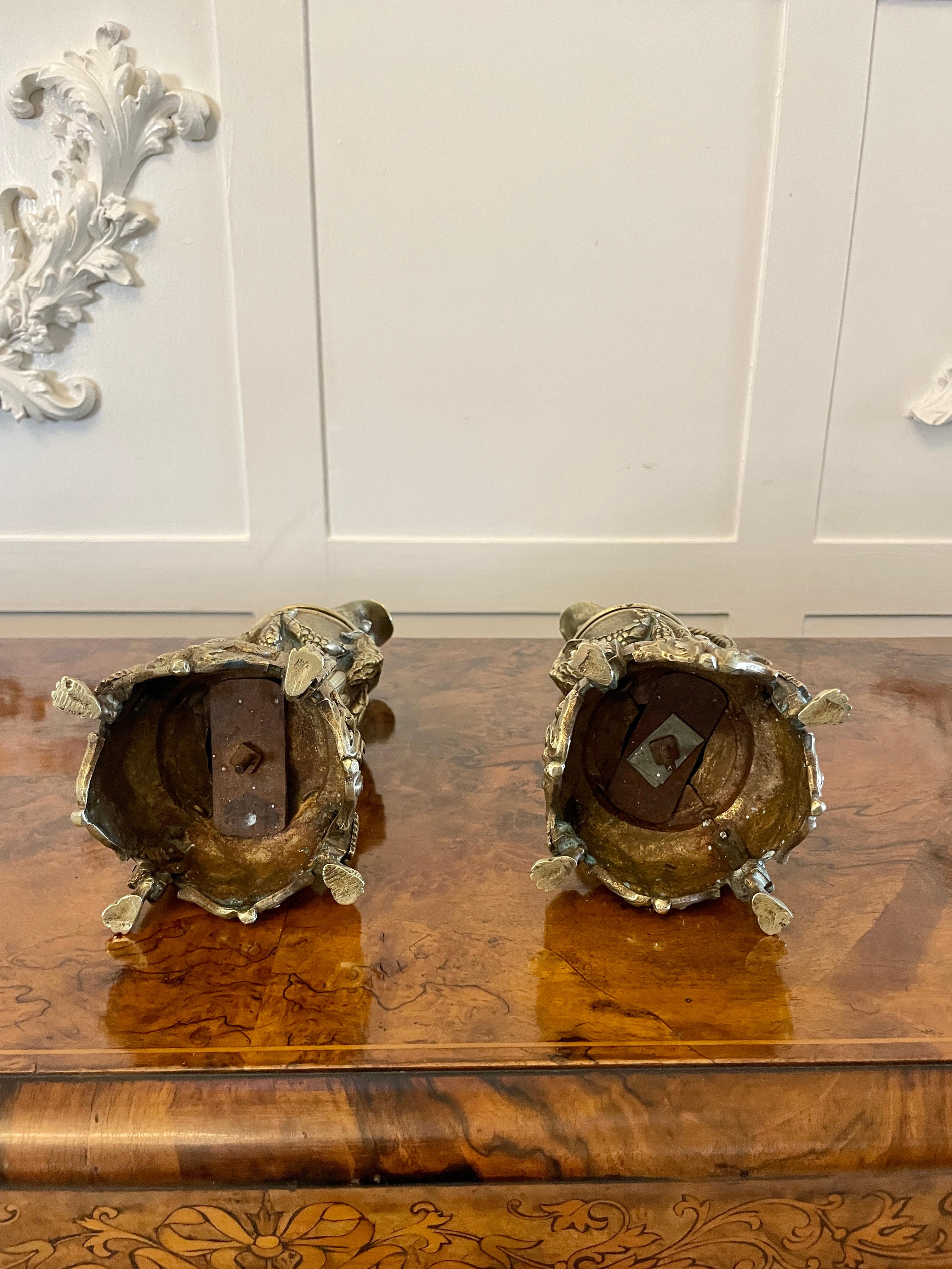 Pair of antique Victorian quality ornate brass Ewers Having quality brass foliate decoration unusual shaped handles ornate swags standing on ornate bases with claw feet


A highly decorative pair in lovely original condition


Dimensions:
Height 