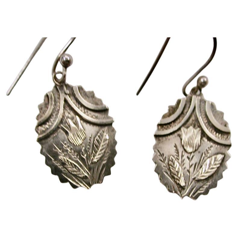 Pair Of Antique Victorian Silver Aesthetic Style Earrings Dated Circa 1880
Fantastic condition considering they are hollow as they should be for this period.
Beautiful applied flower and leaf-work.