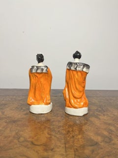 Pair of antique Victorian Staffordshire figures