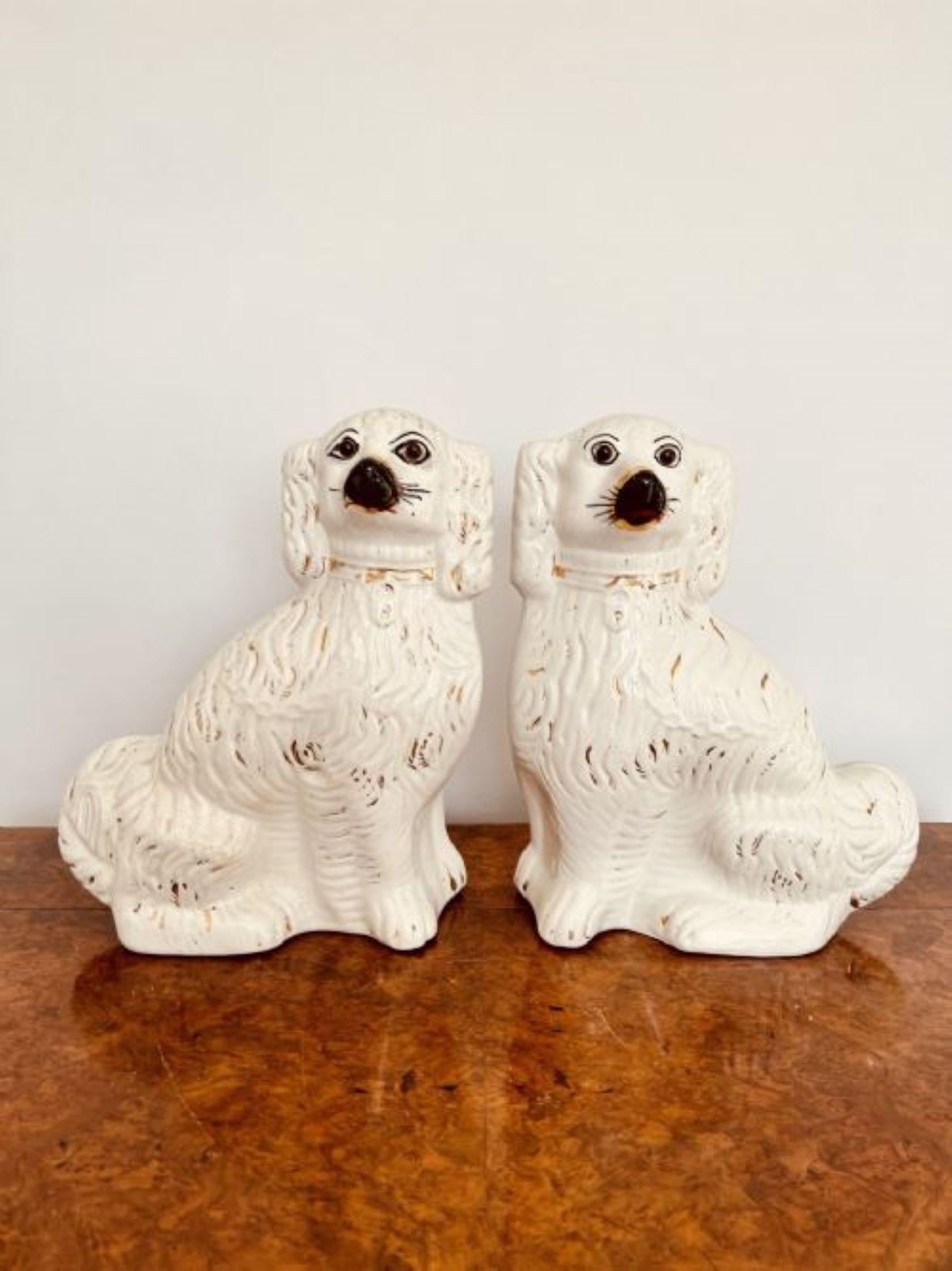 19th Century Pair Of Antique Victorian Staffordshire Spaniel Seated Dogs For Sale