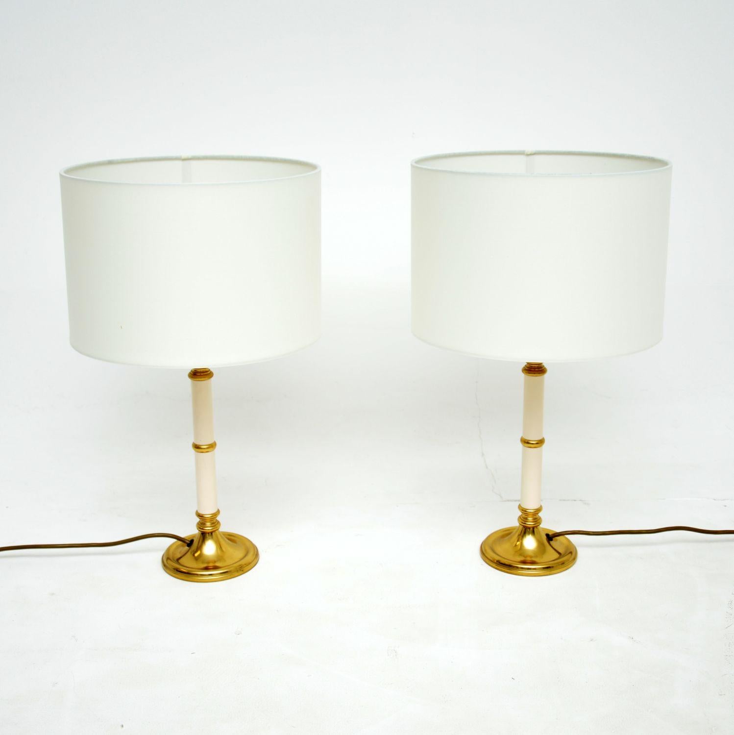 A beautiful pair of solid brass and tole metal table lamps in the antique Victorian style. These were made in England, they date from around the 1970’s.

The quality is superb, these are very well made and are a lovely size.

The condition is