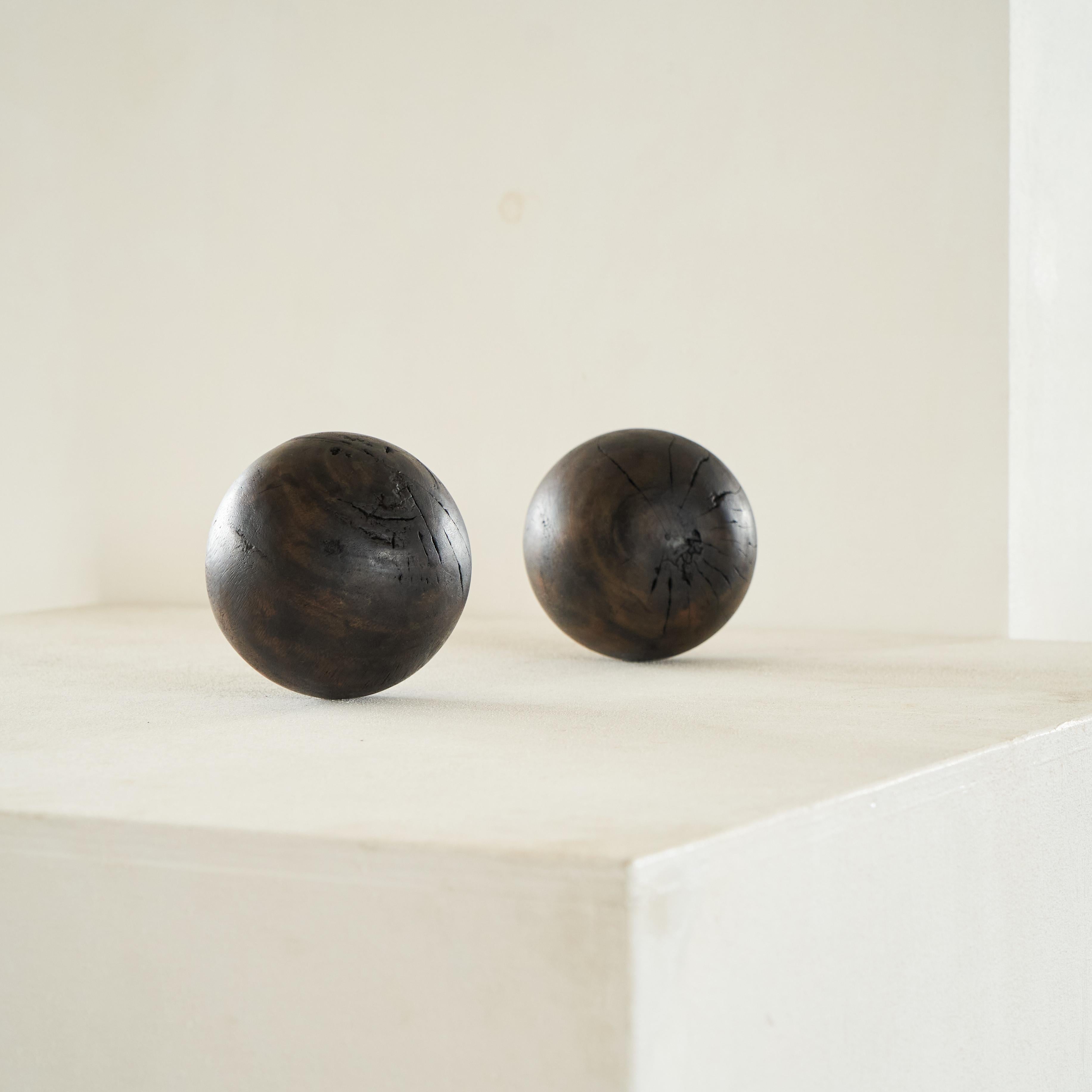 Pair of Antique Wabi Sabi Decorative Balls in Wood.

Wonderful pair of very decorative antique wooden balls. Hand made and with a true wabi sabi appearance, this pair would be perfect on a table or sideboard as decoration. Great hand made feel and