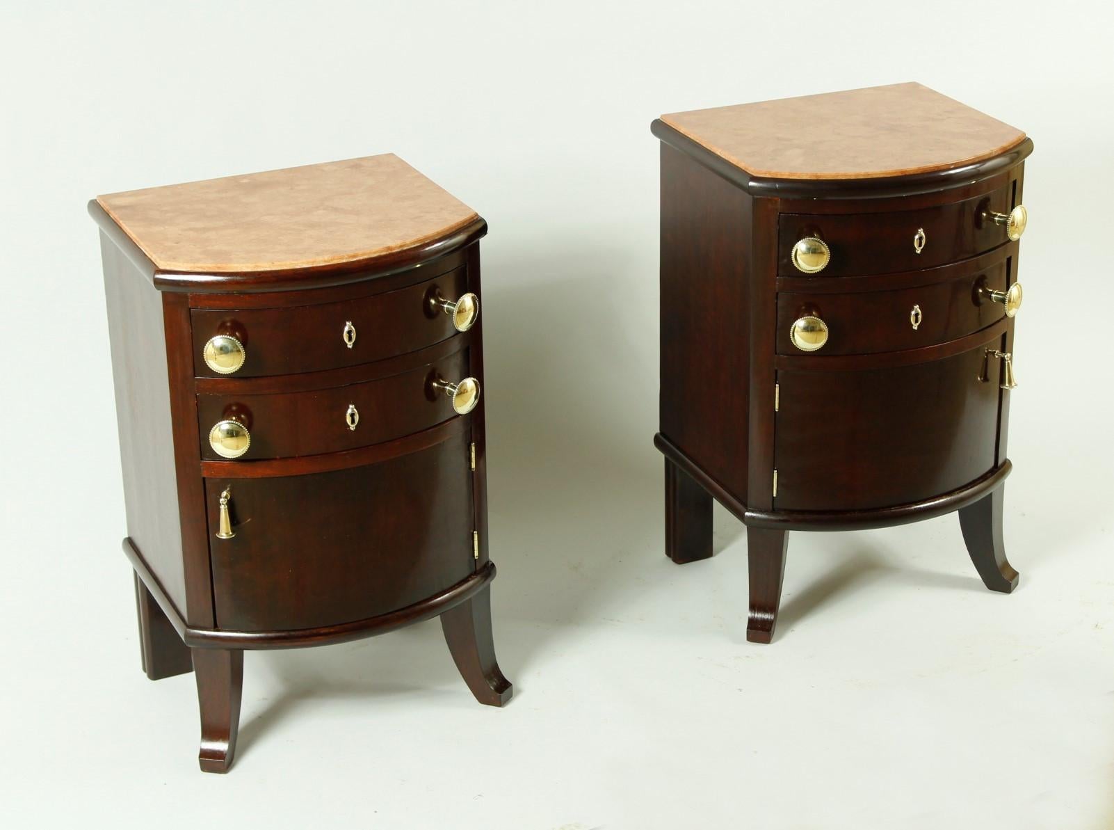 Pair of czech night stands from the early 20th century. They are made from walnut and mahogany with marble top. This night stands have been completely restored.