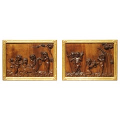 Pair of Antique Walnut Bas Relief Plaques in Giltwood Frames, circa 1880