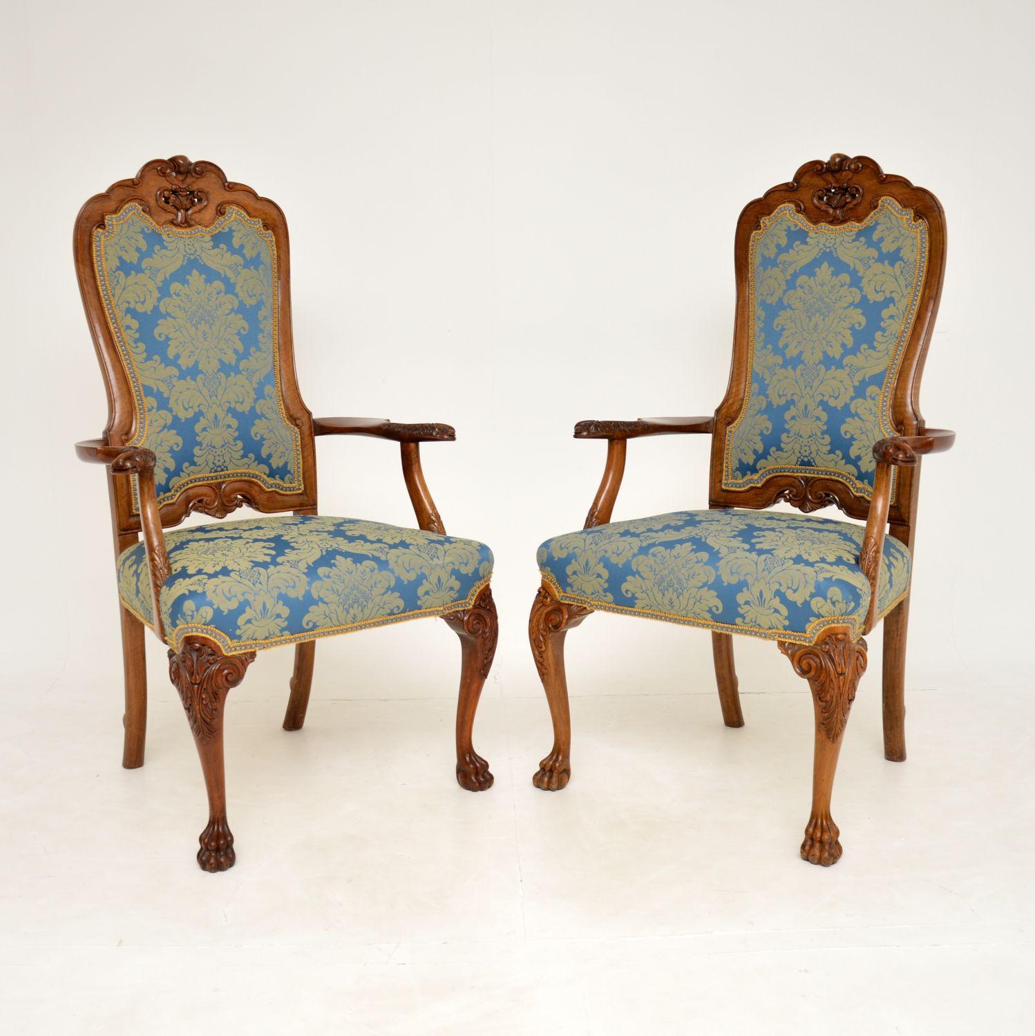 A stunning pair of antique high back carver armchairs in the Queen Anne style. These were made in England, they date from around the 1920’s.

They are of absolutely wonderful quality, they are beautifully designed and extremely elegant. The solid