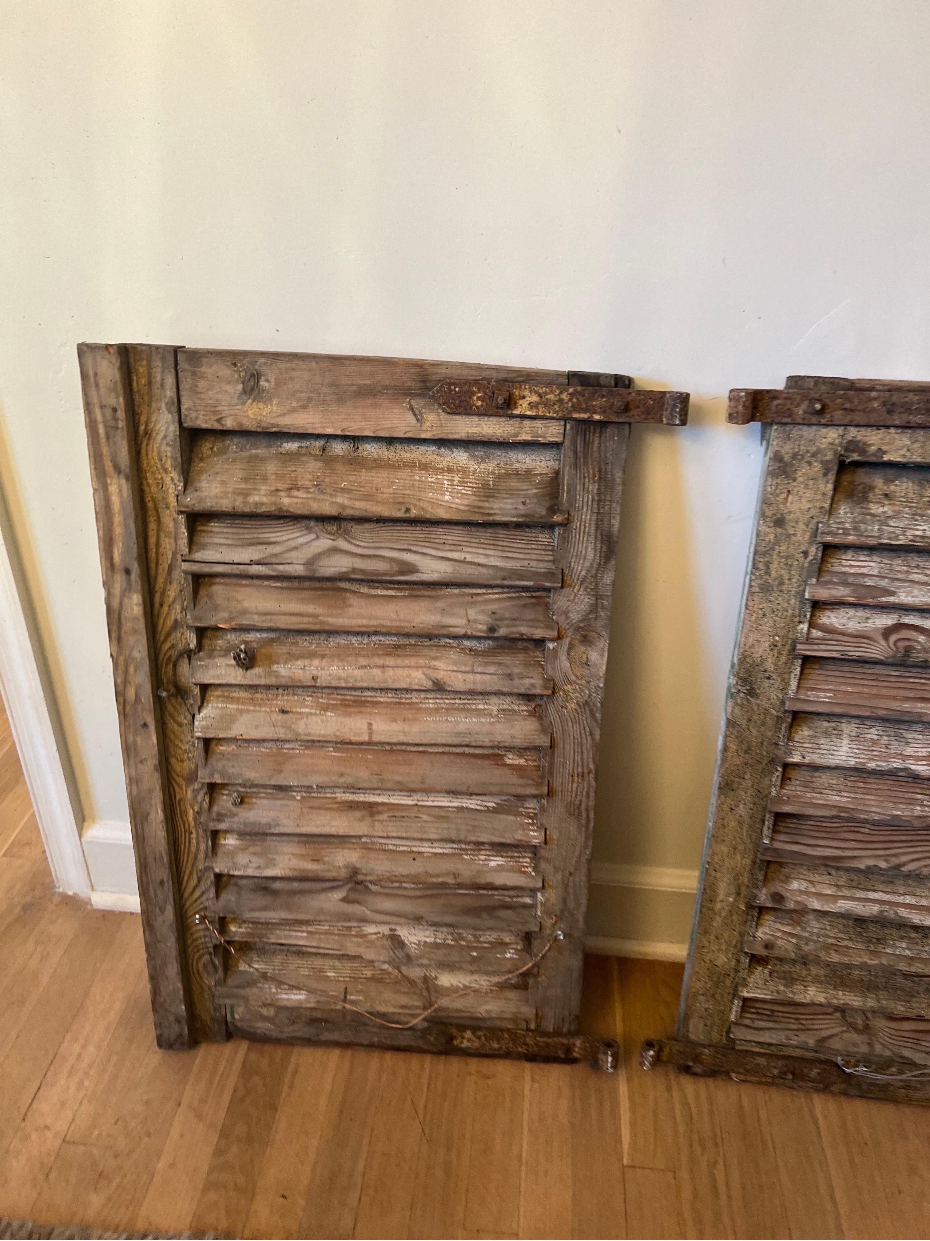 Pair of Antique Weathered Green Shutters  In Distressed Condition For Sale In Los Angeles, CA