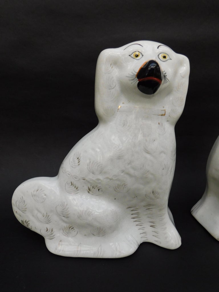 Pair of Antique White English Staffordshire Dogs at 1stDibs