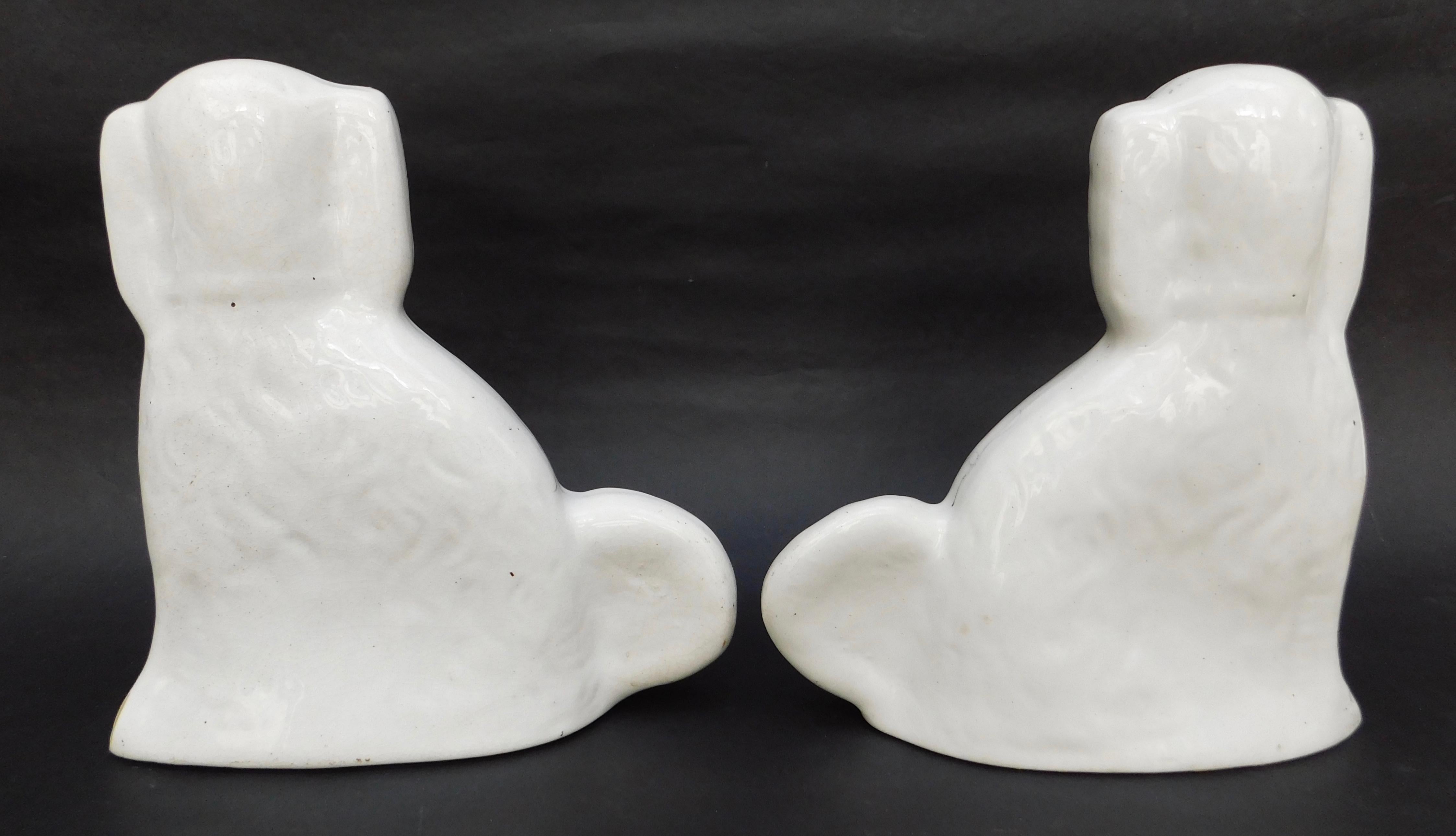 Pottery Pair of Antique White English Staffordshire Dogs