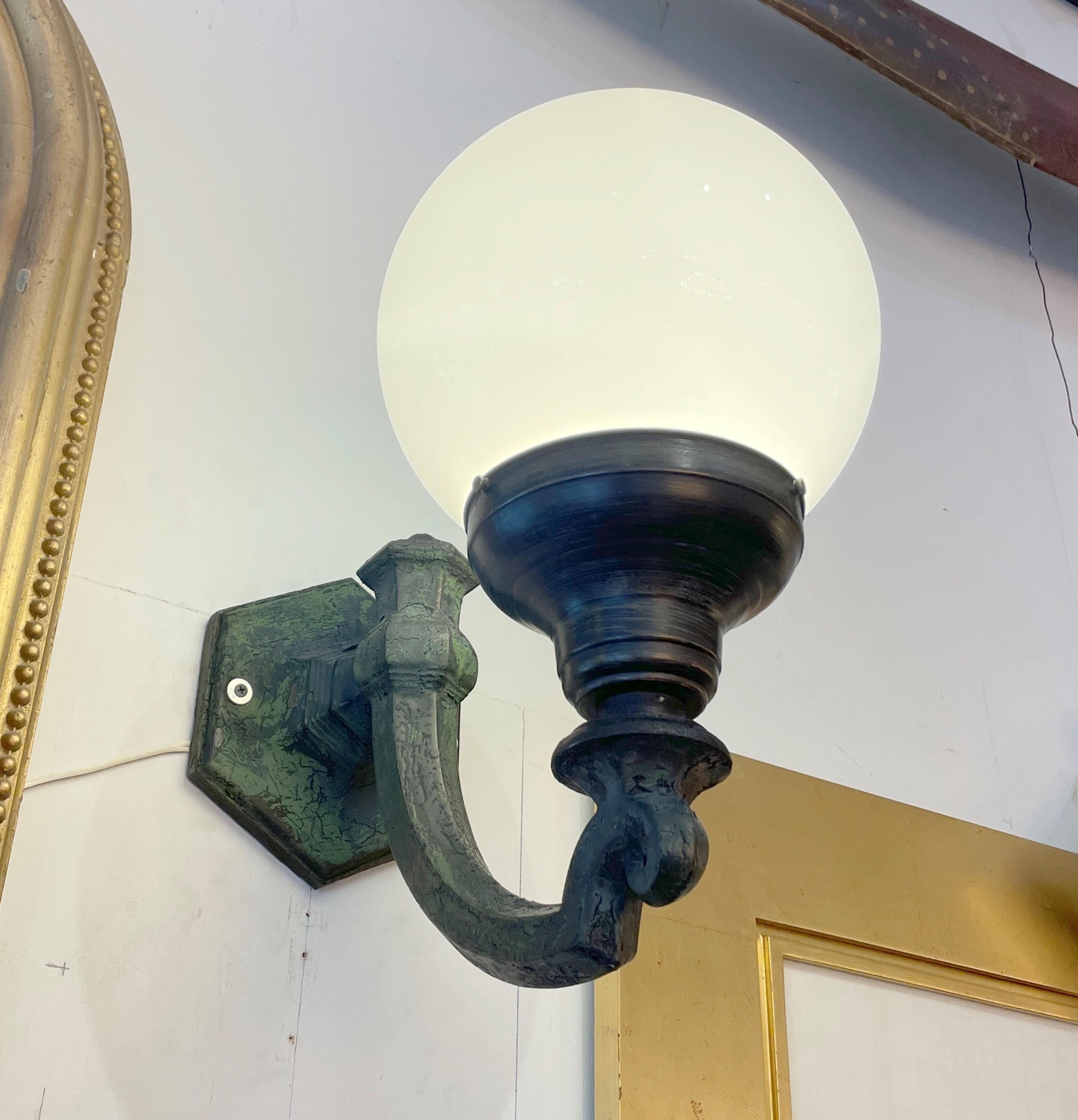 Pair of Antique White Globe Cast Iron Outdoor Sconces In Good Condition In New York, NY