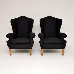 Pair of Antique Wing Back Armchairs by Hille