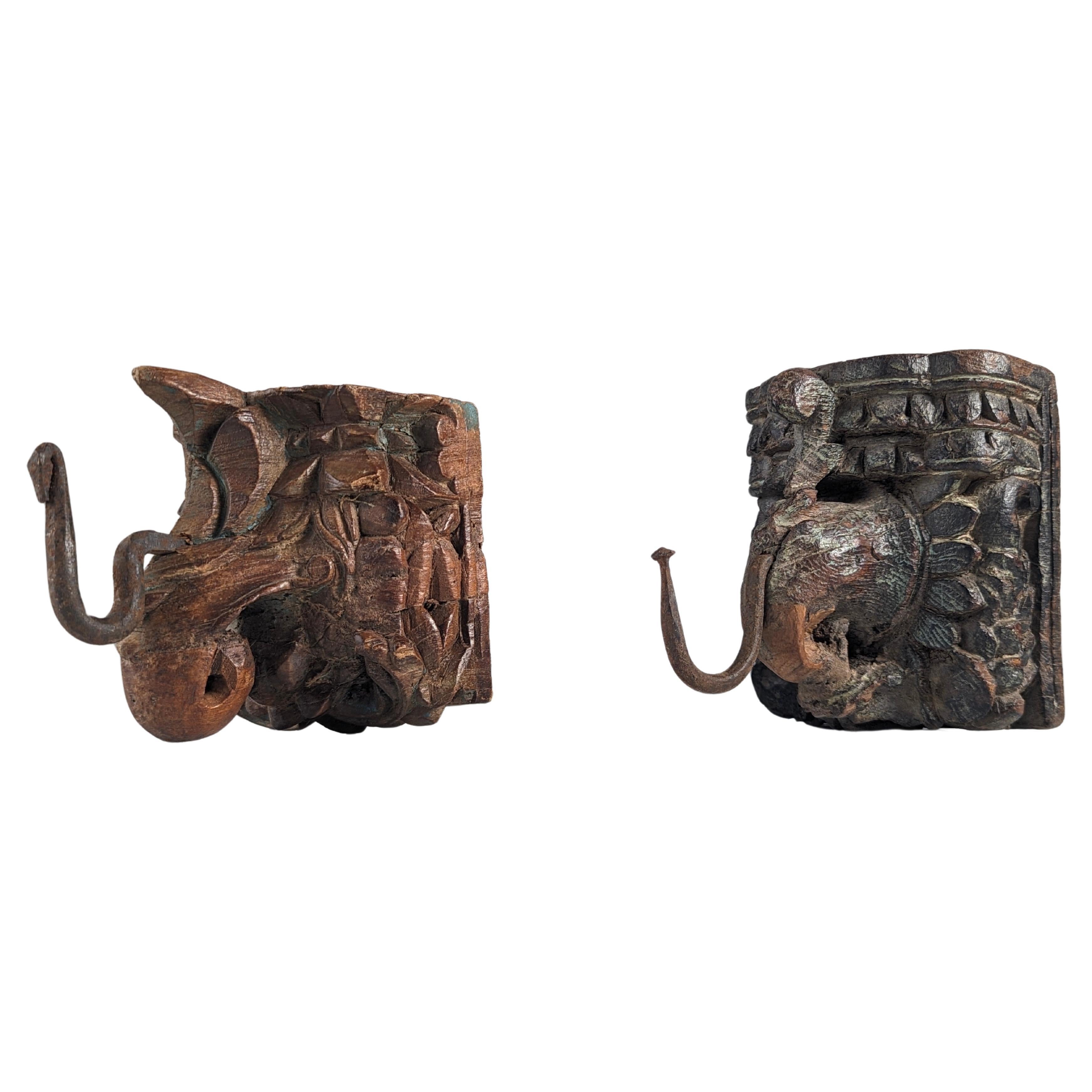Pair of Antique Wood Carved Elephant Head Hangers, India