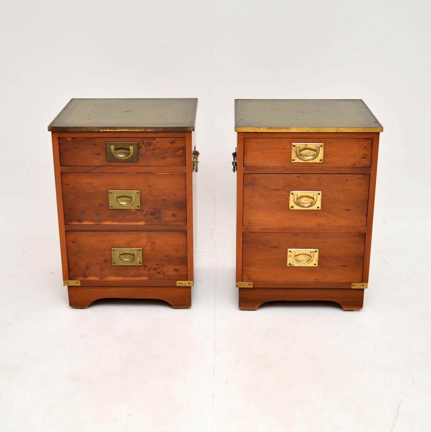 A smart and very well made pair of antique yew wood military campaign bedside chests with leather tops. They were made in England, they date from around the 1950’s.

They are of superb quality and are a very useful size. The yew wood has a lovely