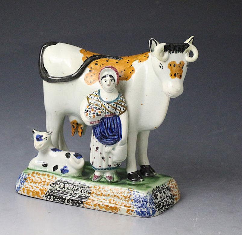 English Pair of Antique Yorkshire Pottery Prattware Cows from Mexborough Pottery For Sale