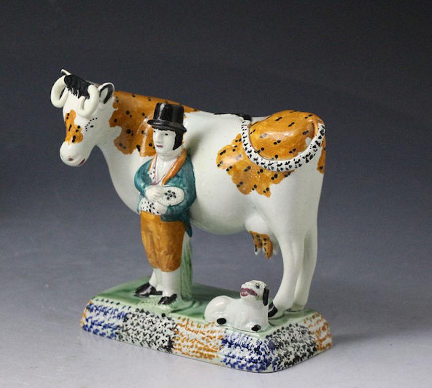 Pair of Antique Yorkshire Pottery Prattware Cows from Mexborough Pottery In Good Condition For Sale In Woodstock, OXFORDSHIRE