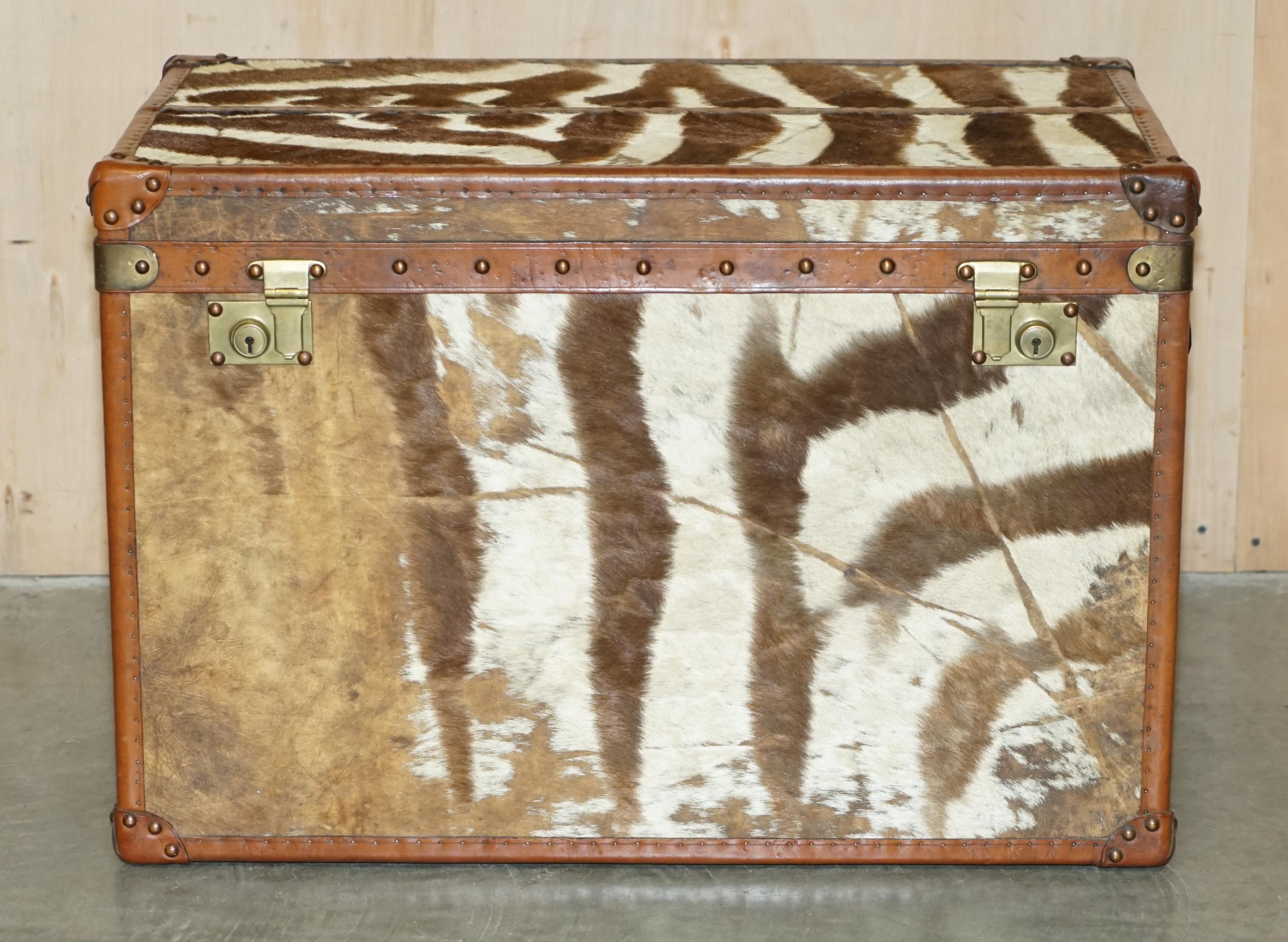 English PAiR OF ANTIQUE ZEBRA SKIN & LEATHER UPHOLSTERED STEAMER TRUNKS CHESTS TABLES