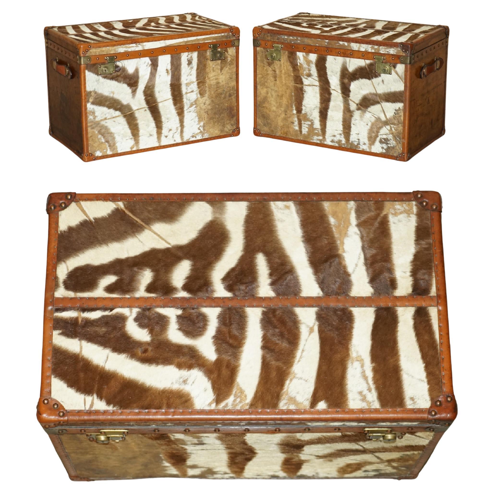 PAiR OF ANTIQUE ZEBRA SKIN & LEATHER UPHOLSTERED STEAMER TRUNKS CHESTS TABLES