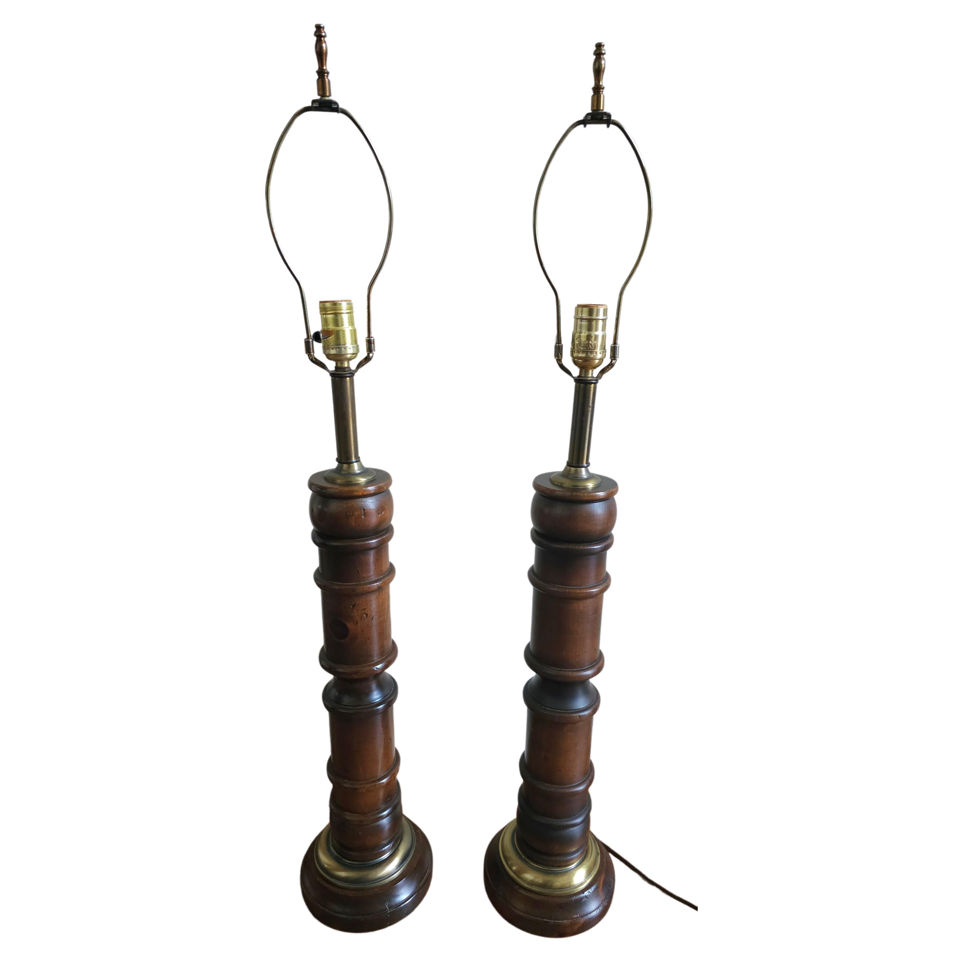 A Pair Of Antiqued Pine Wood and Brass Column-Form Table Lamps in great vintage condition. Measures 6.5