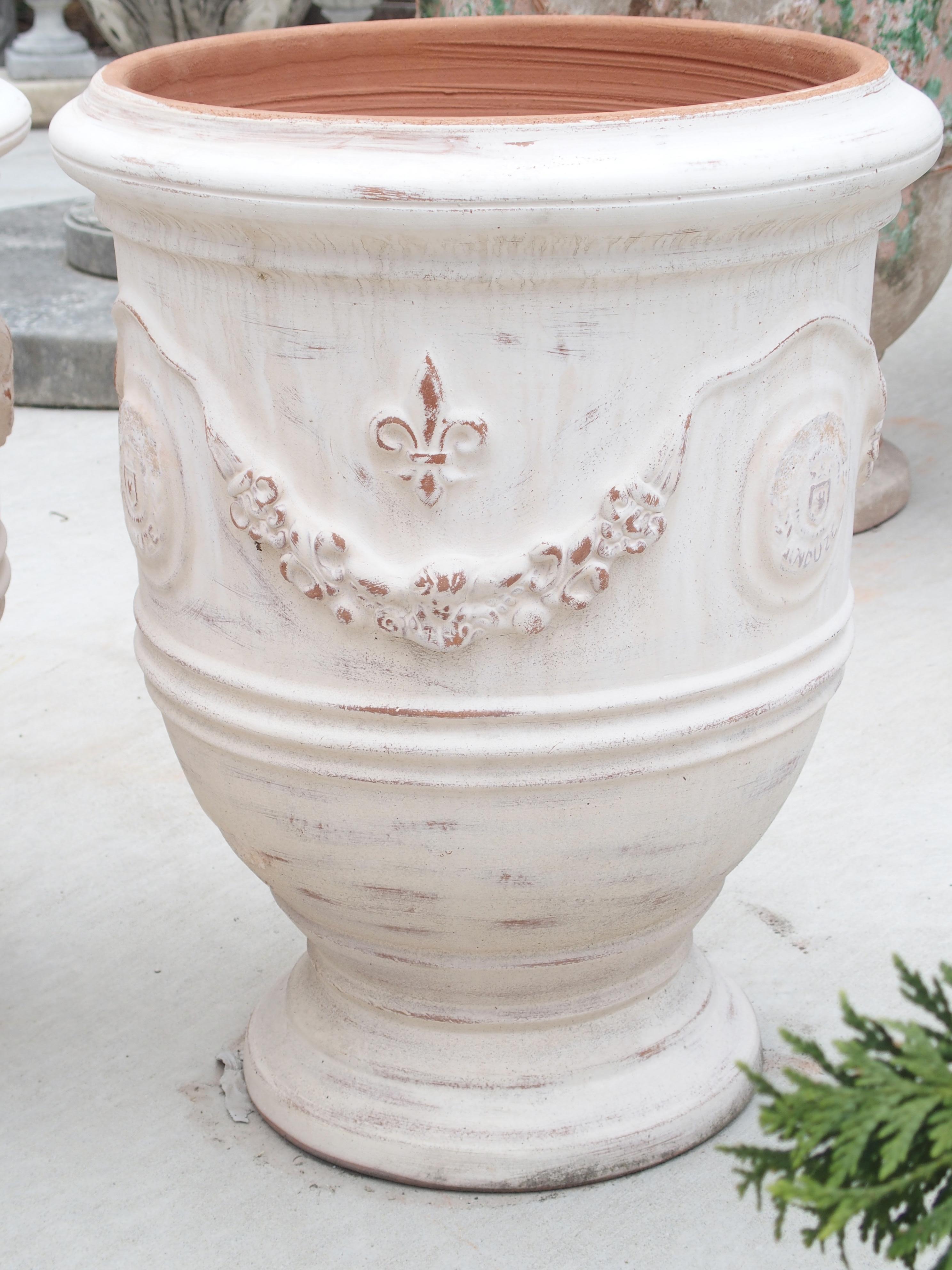 Contemporary Pair of Antiqued White Fleur-de-Lys Anduze Pots from France