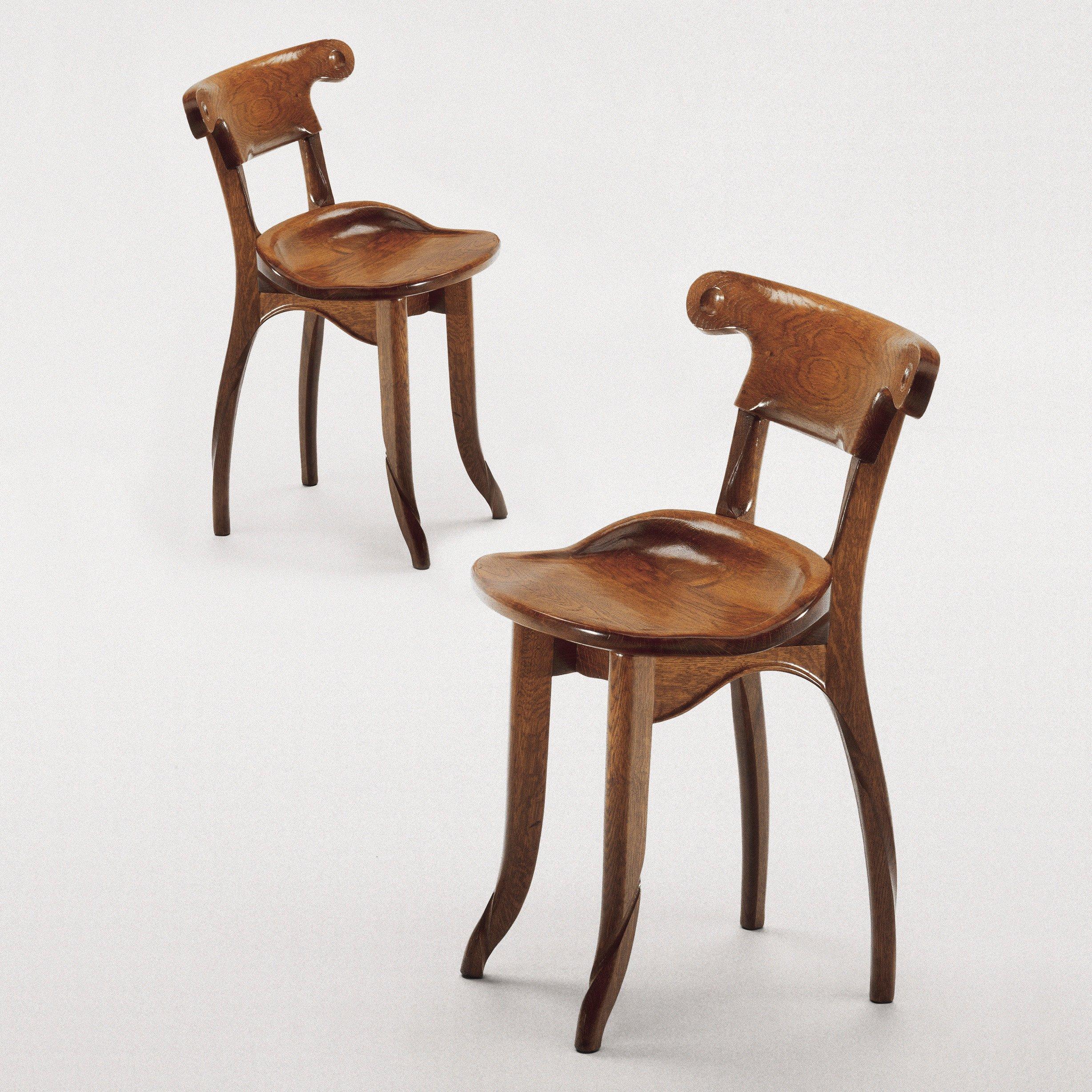 Batllo chairs designed by Antoni Gaudi, circa 1906.
Manufactured by BD furniture in Barcelona.

Solid varnished oak
Measures: 47 x 52 x 74 H cm.
 